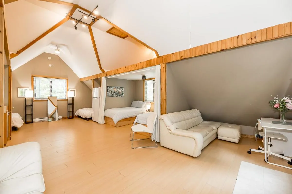 Bed in Muskoka Lakeshore Cottage Bliss