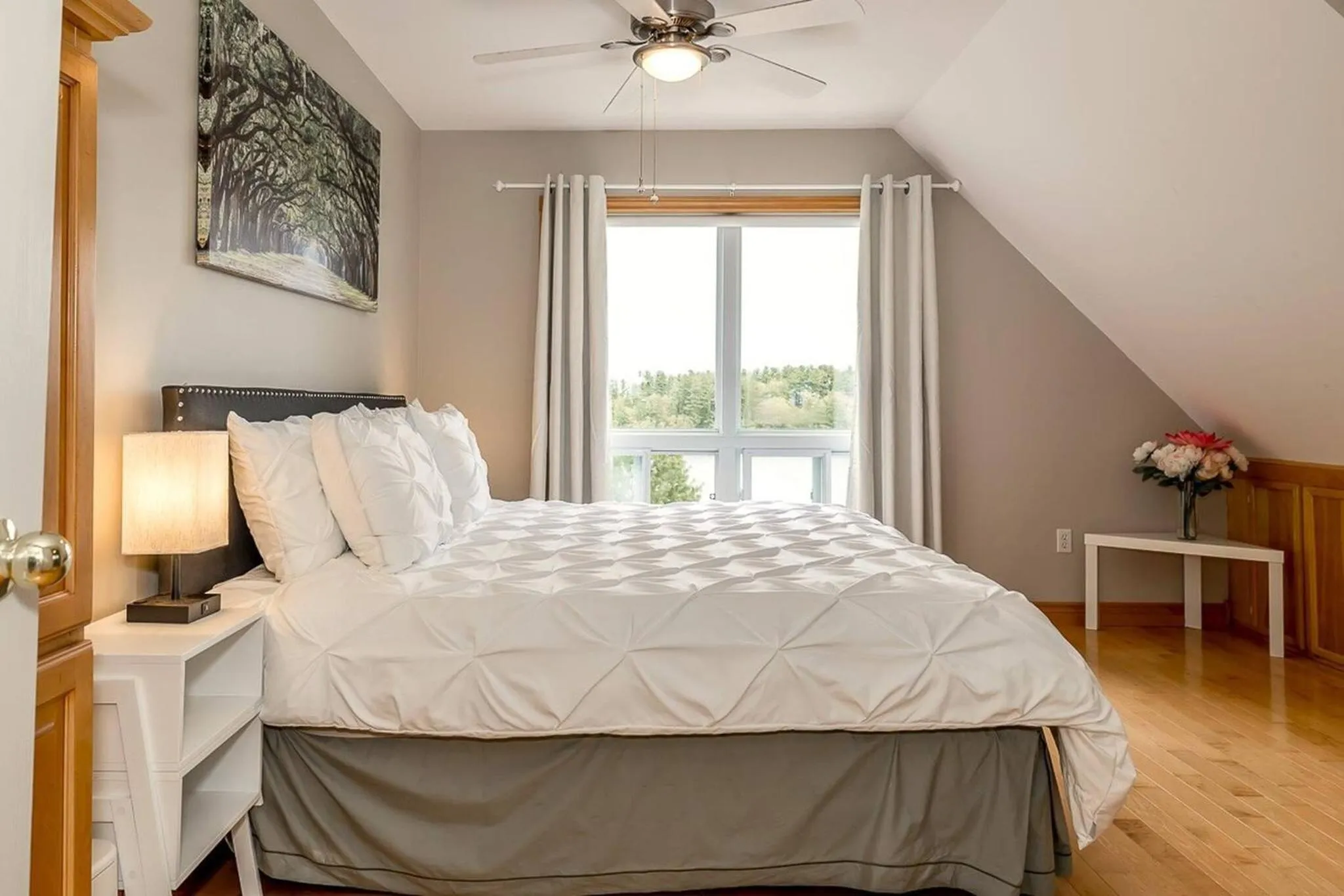 Bed in Muskoka Lakeshore Cottage Bliss