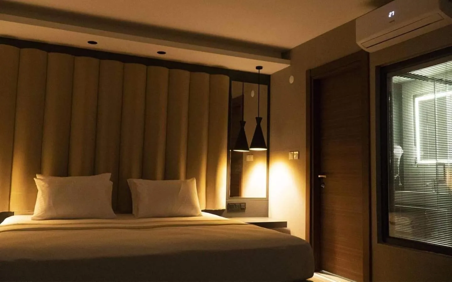 Bed in Bloom Suite Hotel