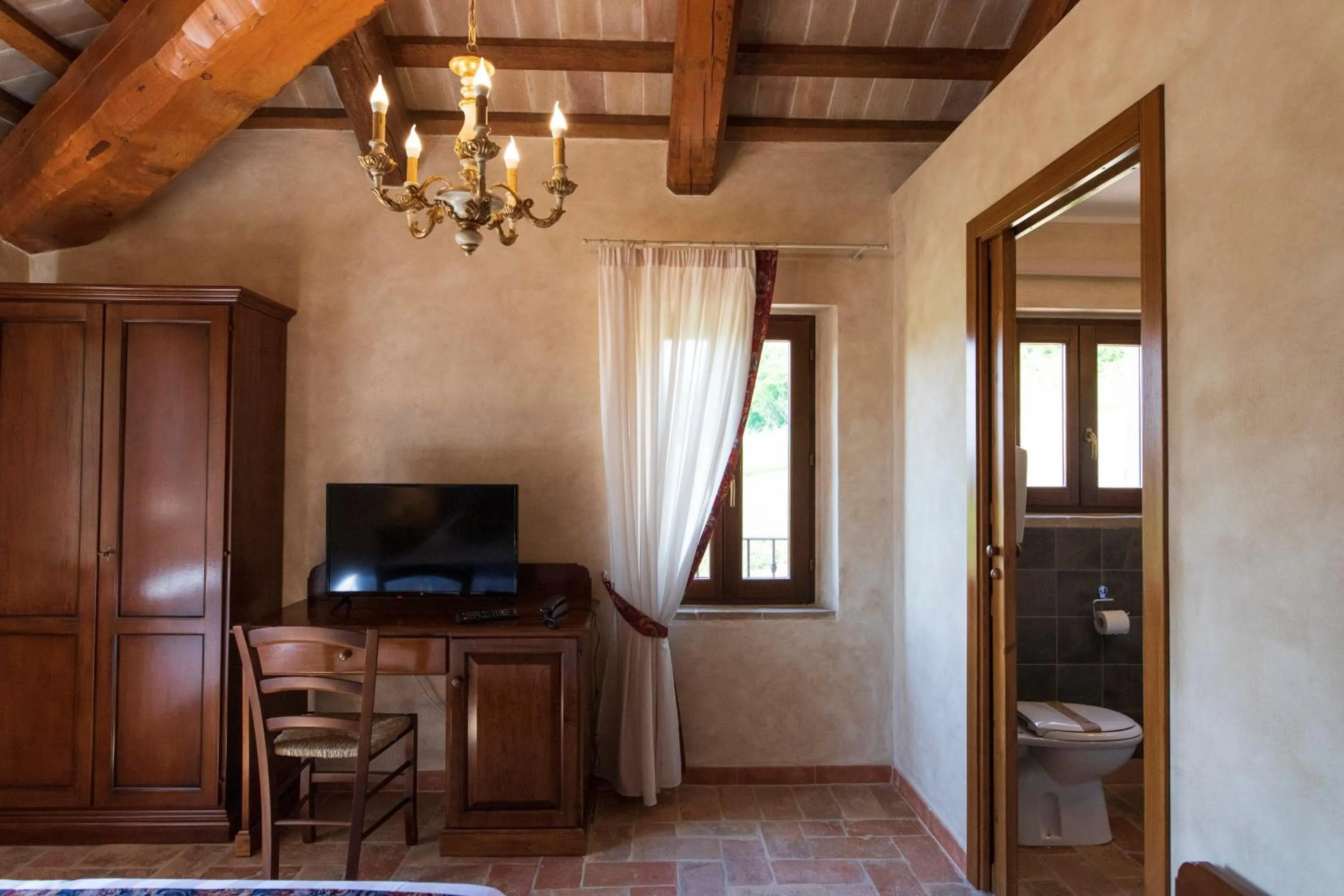 Bedroom in Locanda di Montegiove