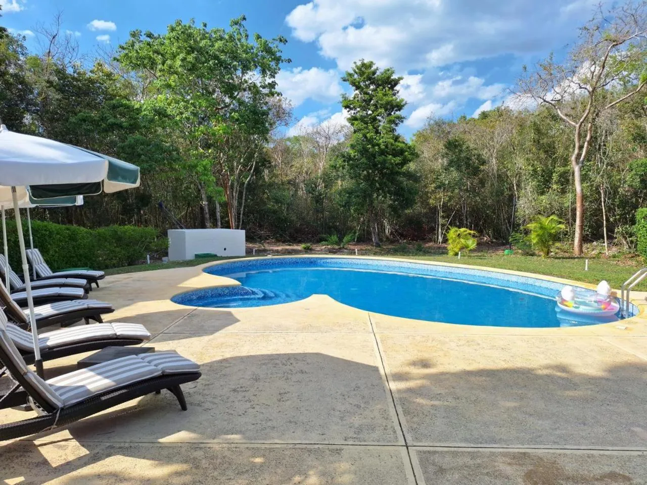 Swimming pool in hotel villas chicanna