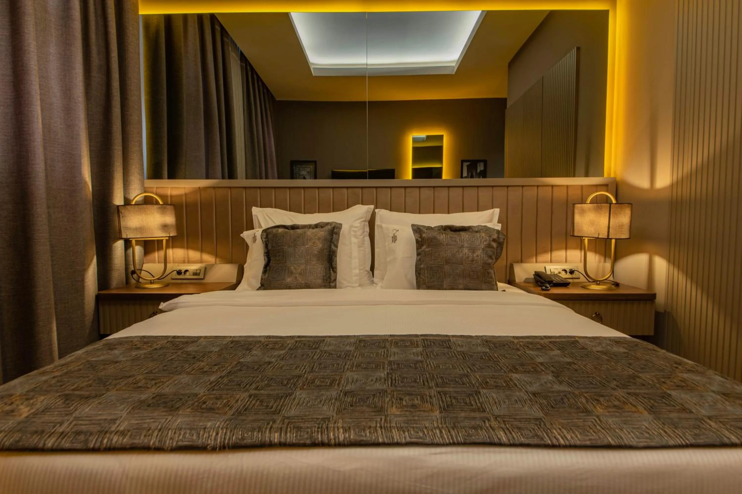 Bed in Four Mansions Hotel
