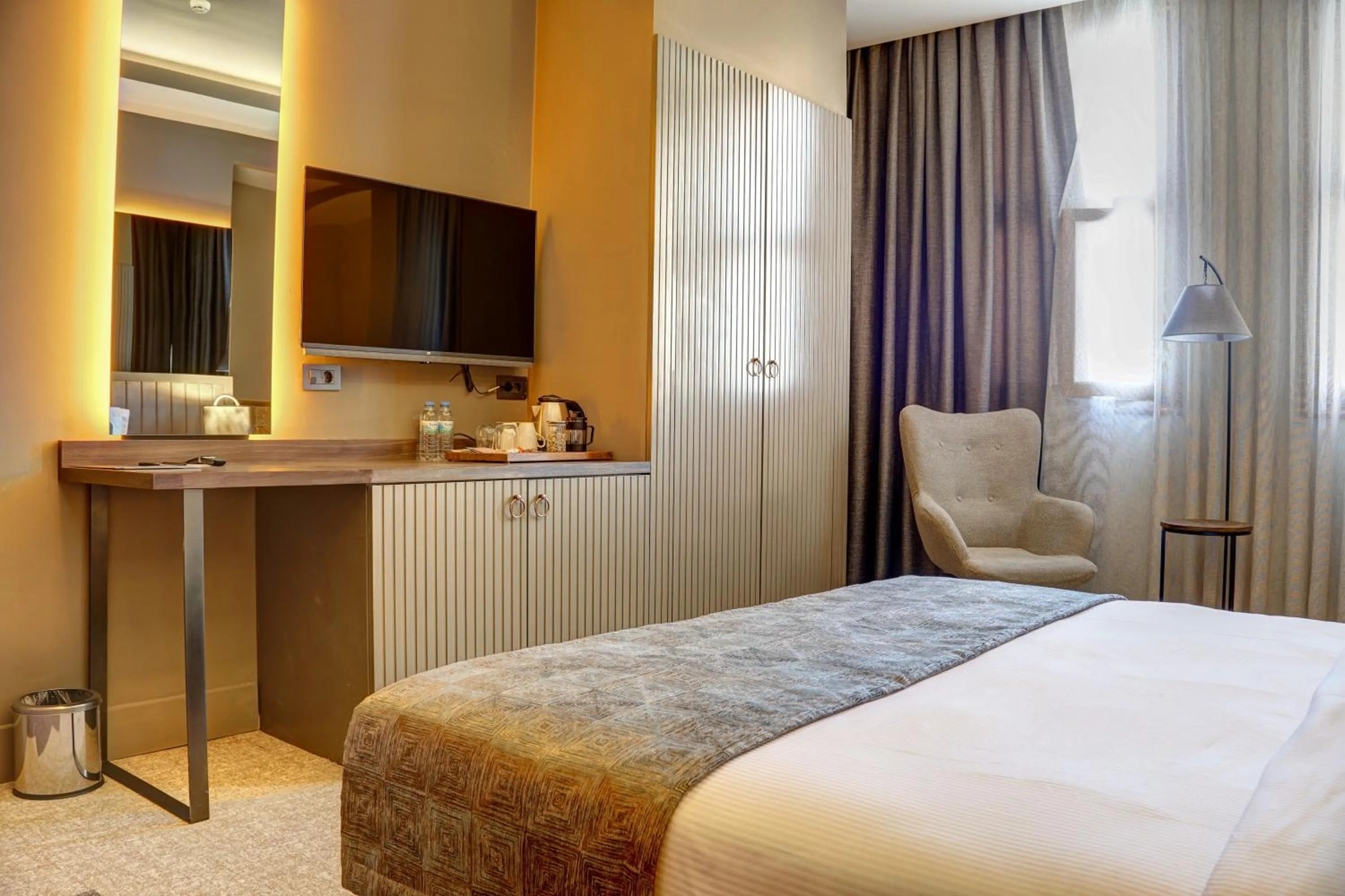 Bed in Four Mansions Hotel