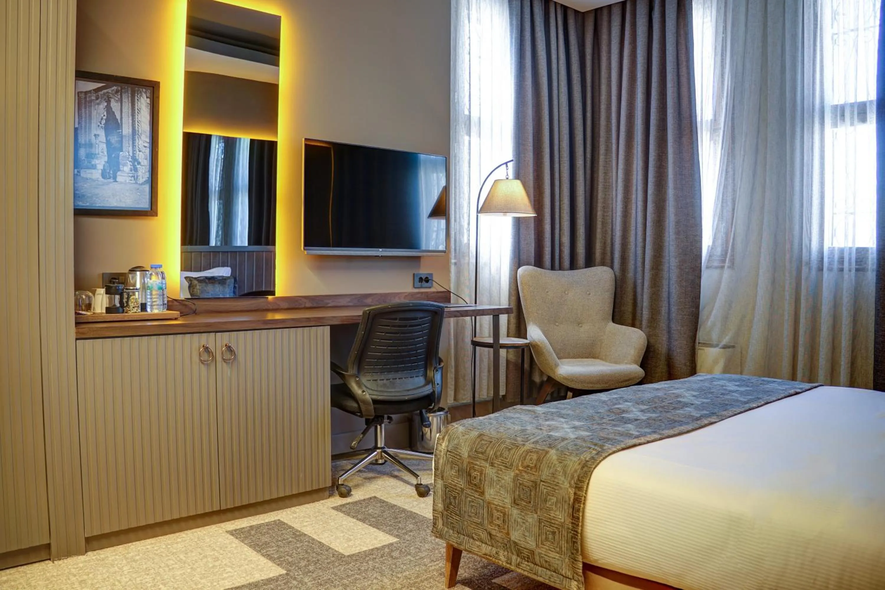 Bed in Four Mansions Hotel