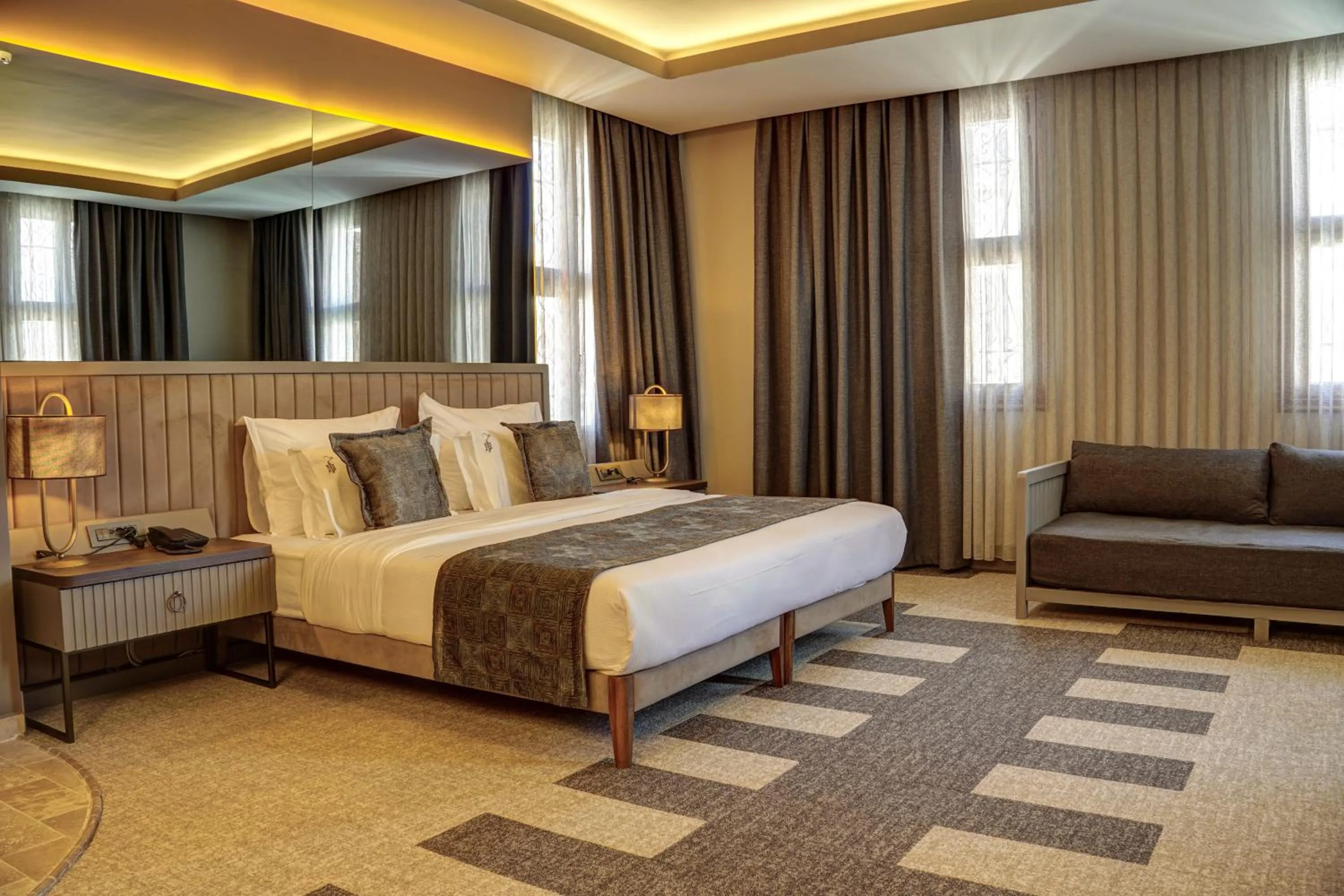 Bed in Four Mansions Hotel