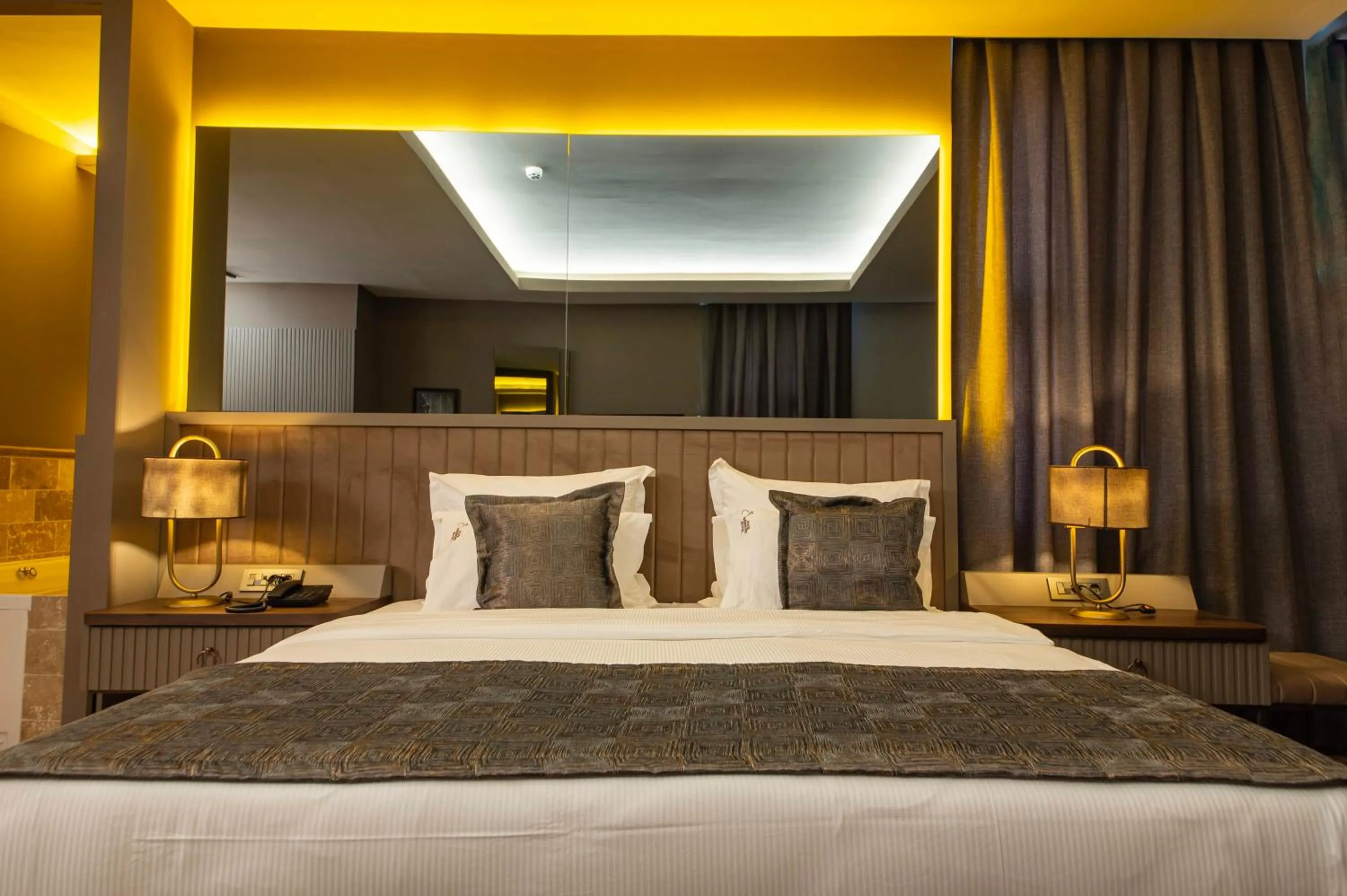 Bed in Four Mansions Hotel