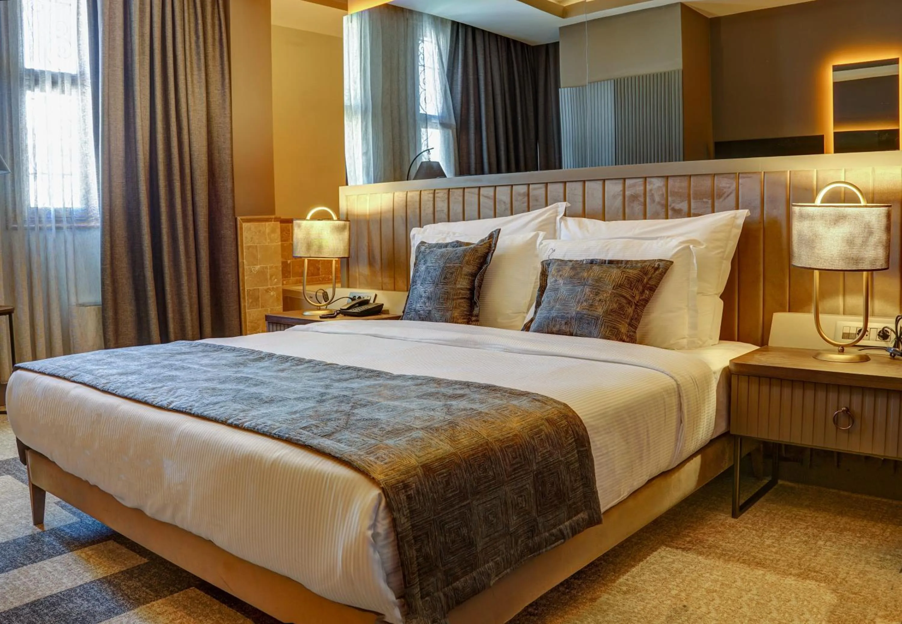 Bed in Four Mansions Hotel