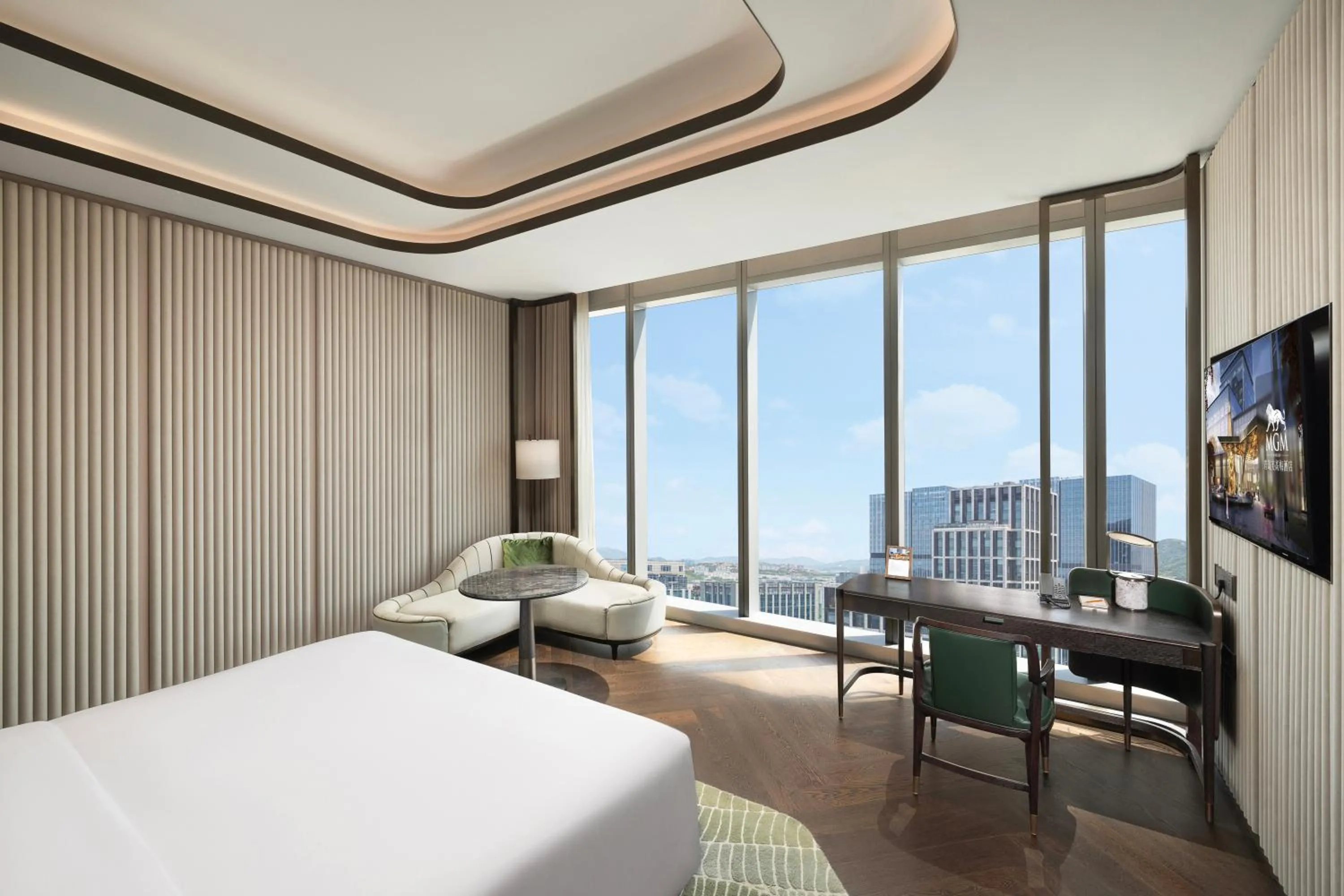 Living room, Bed in MGM Qingdao