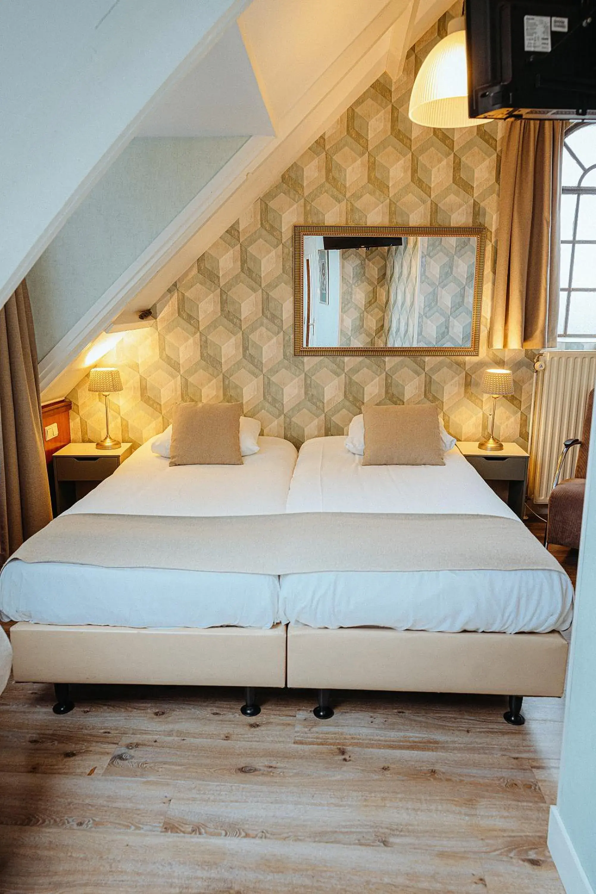 Bed in Hotel Johannes Vermeer Delft Bed in Hotel Johannes Vermeer Delft