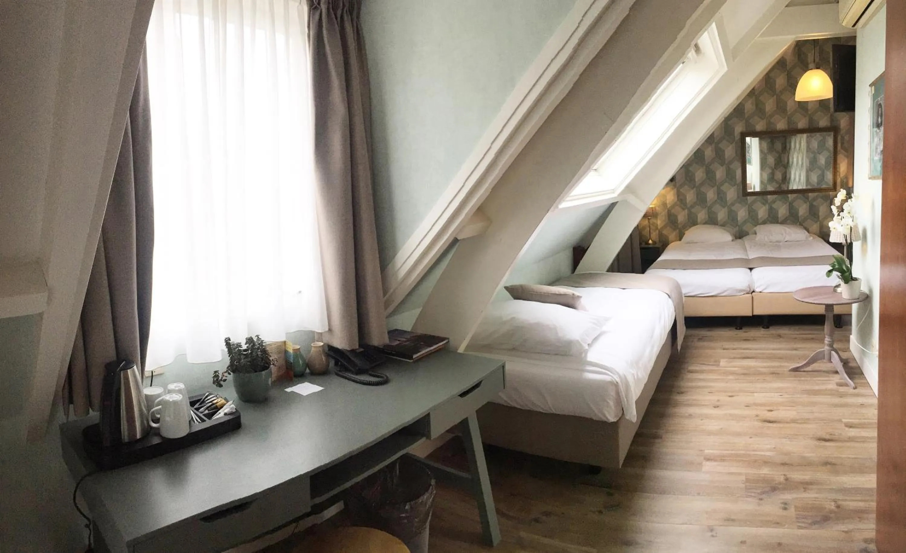 Bed in Hotel Johannes Vermeer Delft