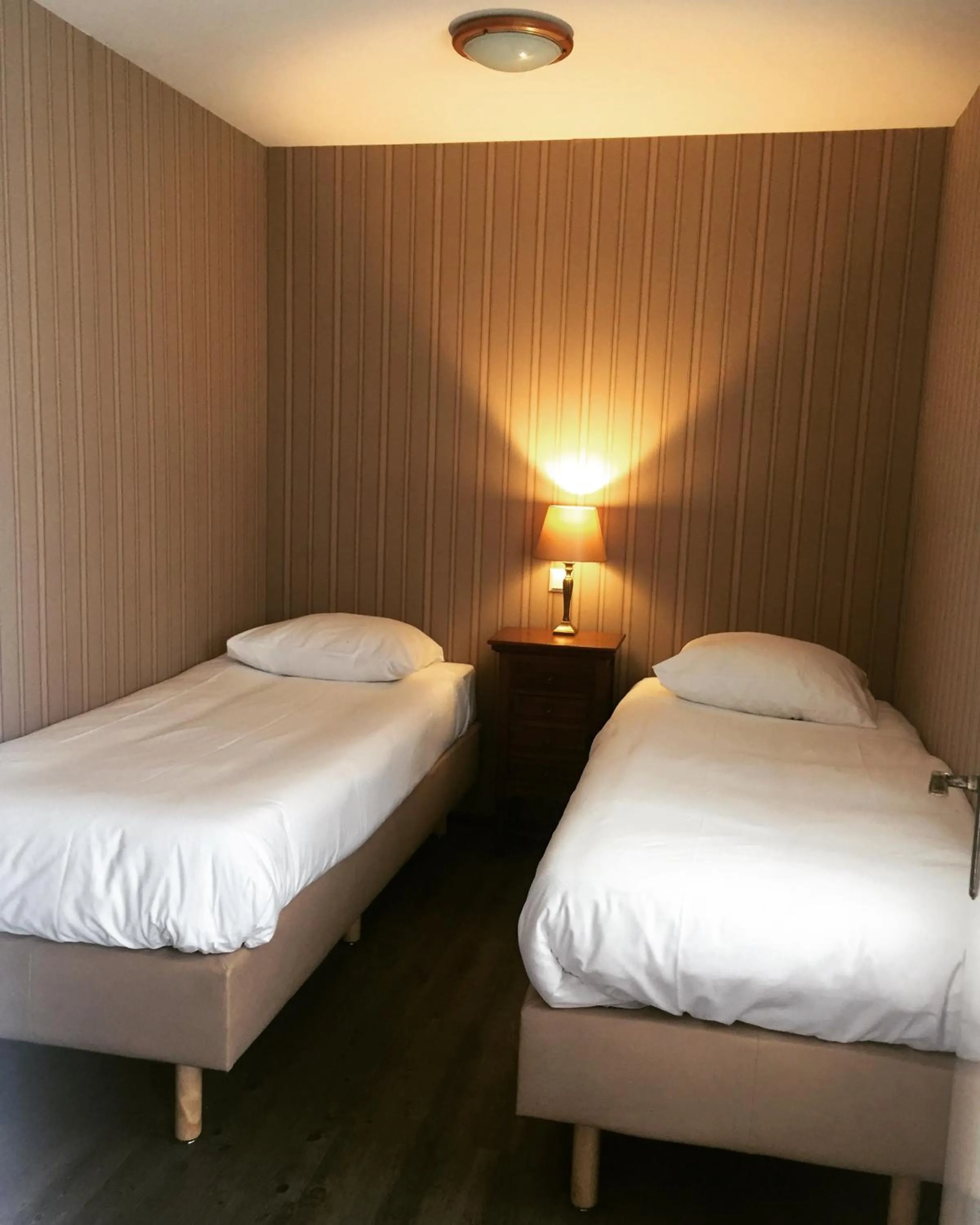 Bed in Hotel Johannes Vermeer Delft