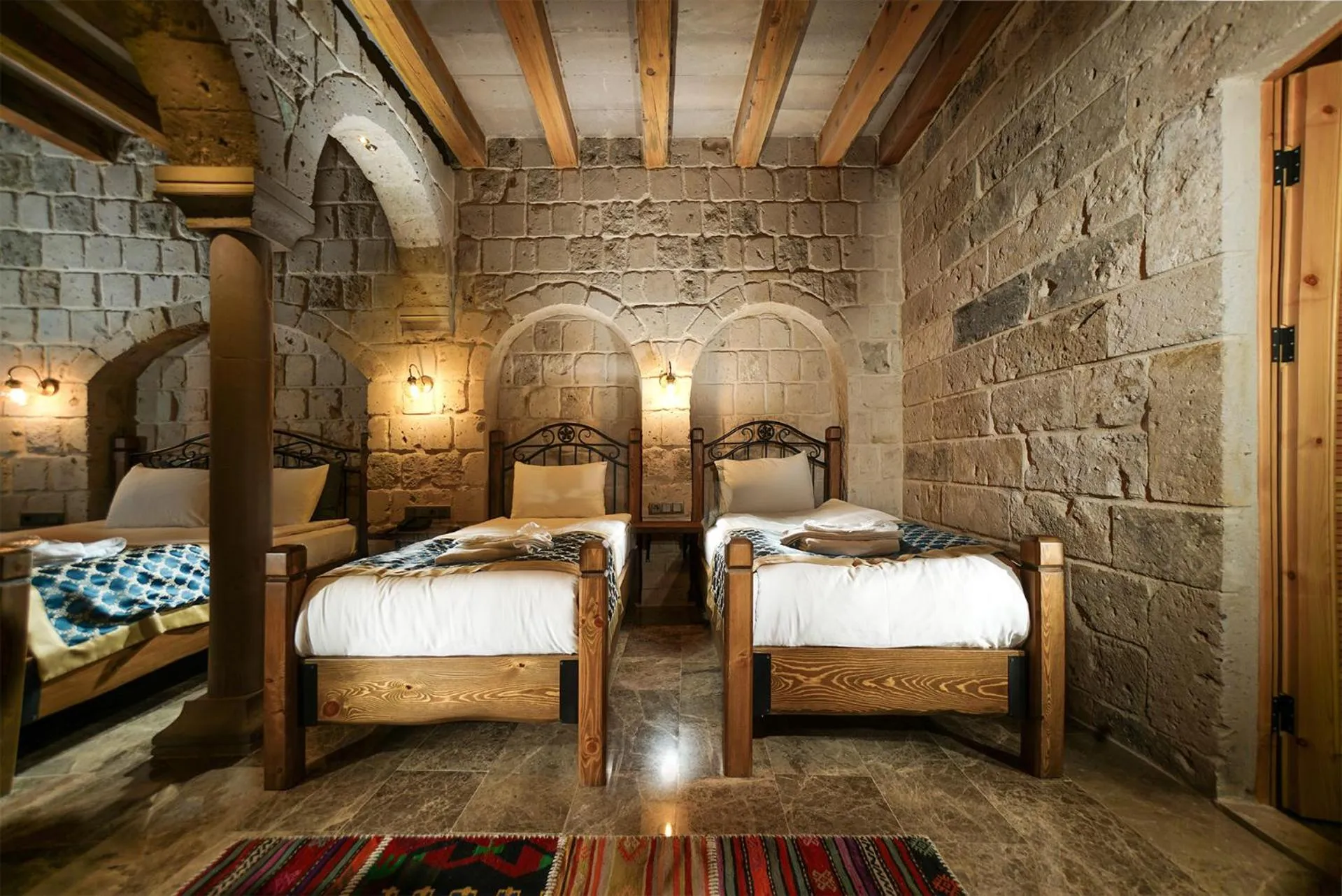 Bed in Caverna Hotel Premium Caves