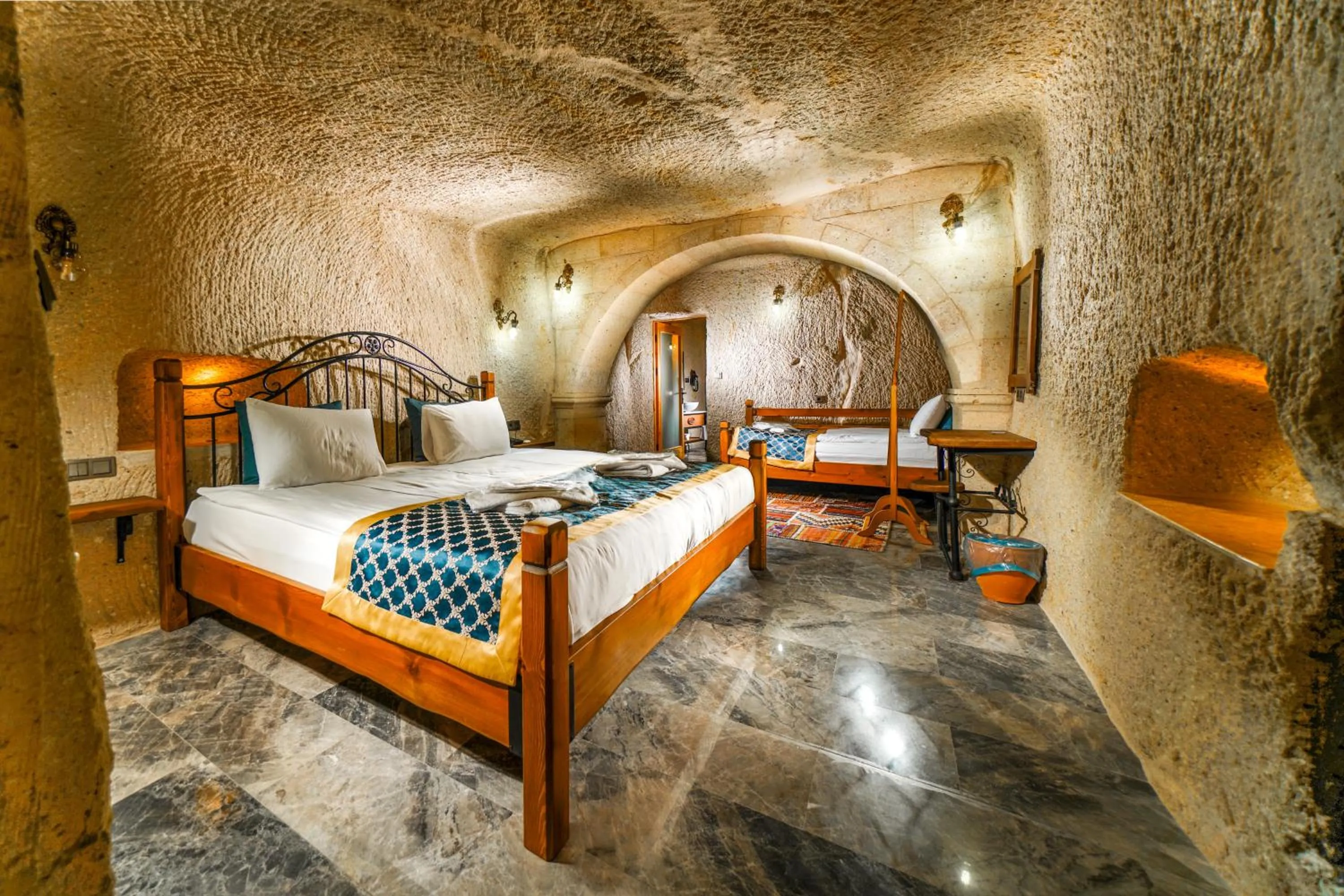 Bed in Caverna Hotel Premium Caves