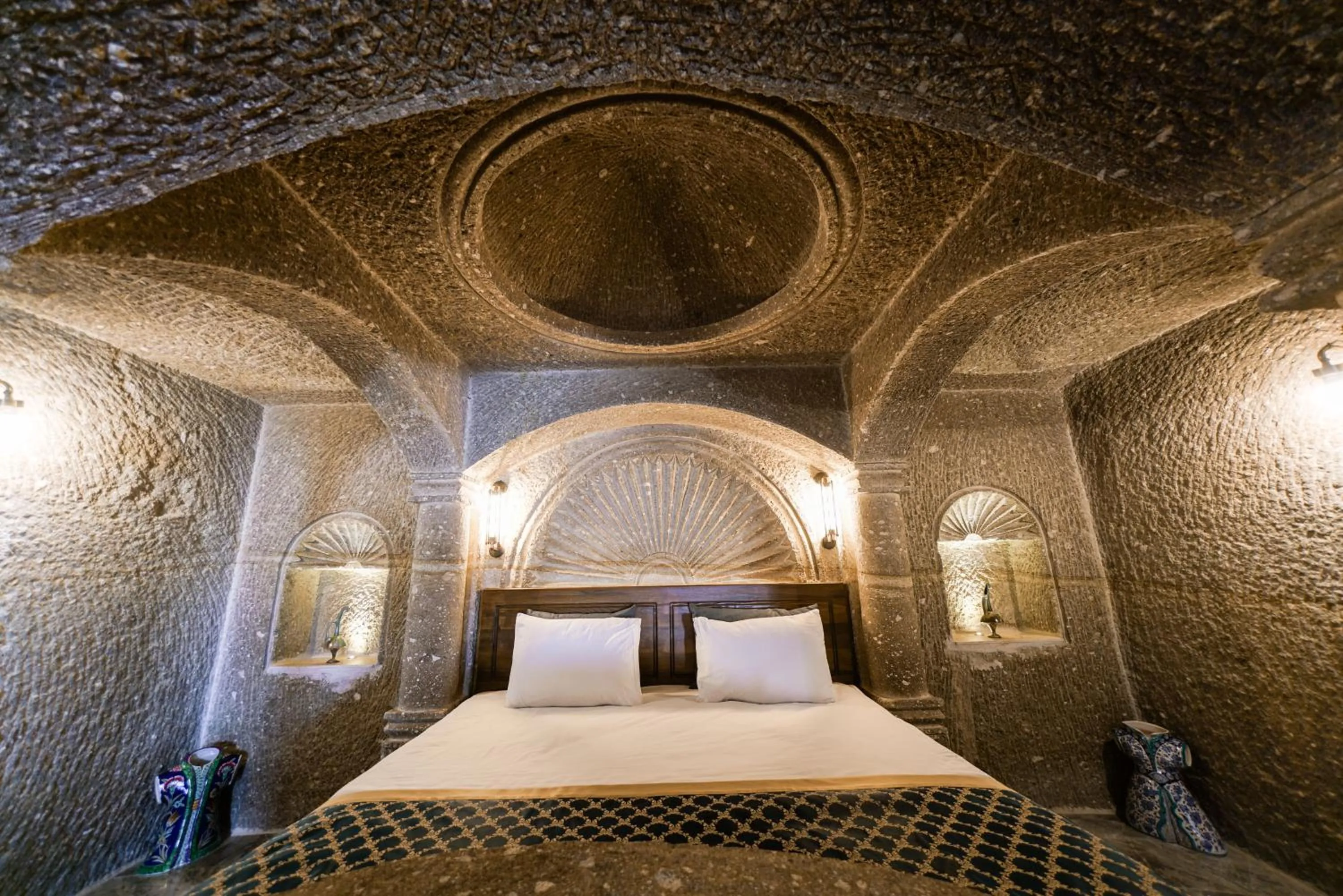 Bed in Caverna Hotel Premium Caves