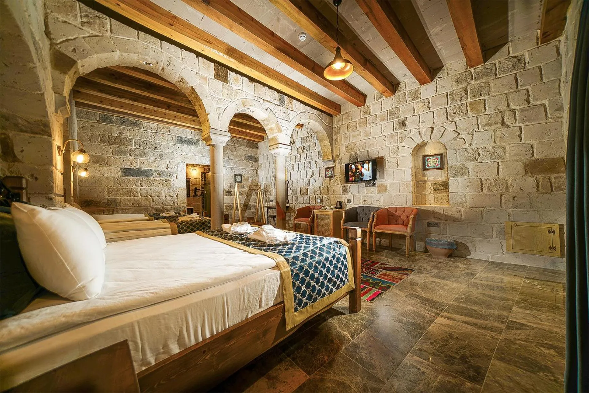 Bed in Caverna Hotel Premium Caves
