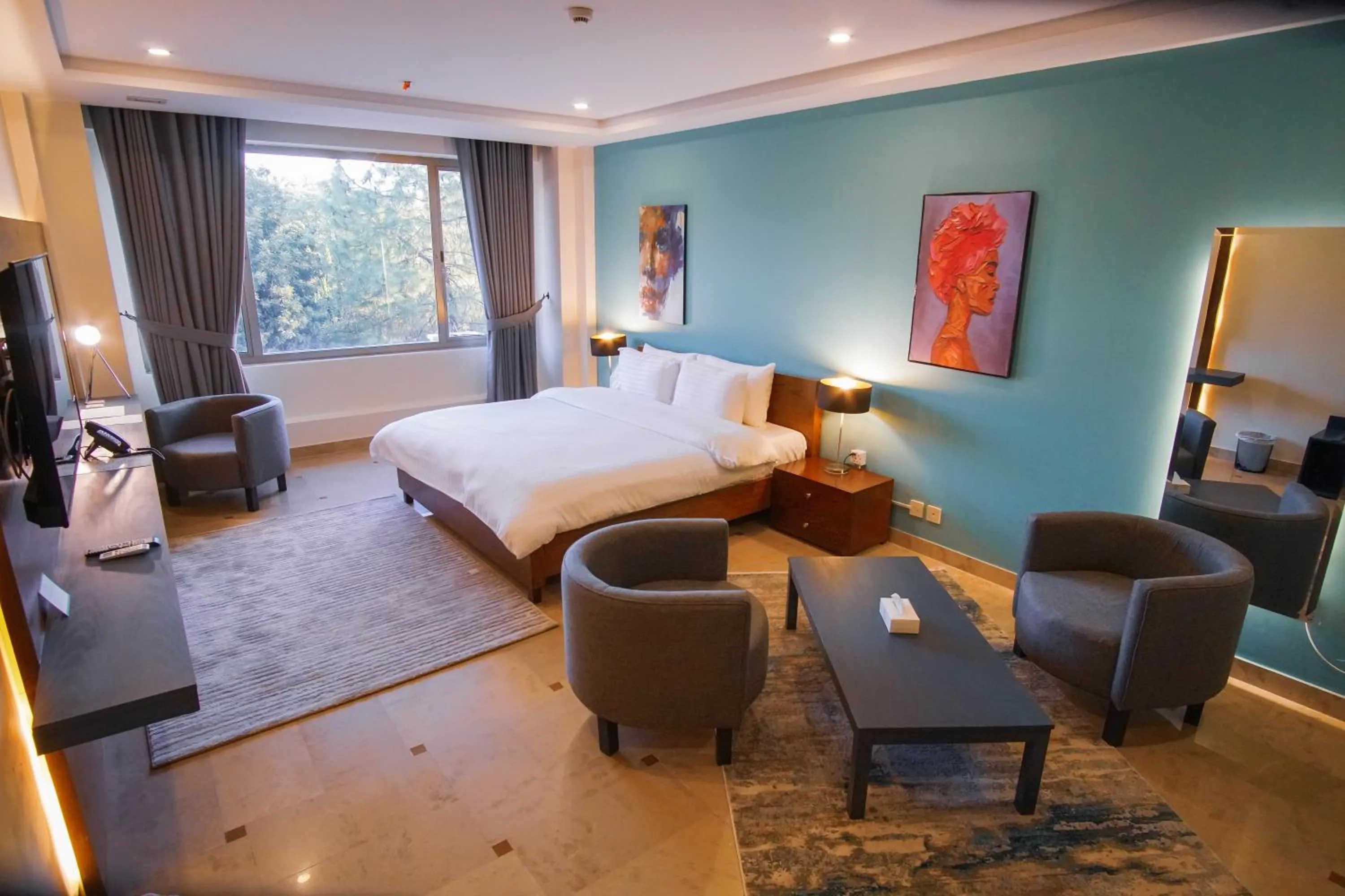 Bed in Roomy Signature Hotel, Islamabad