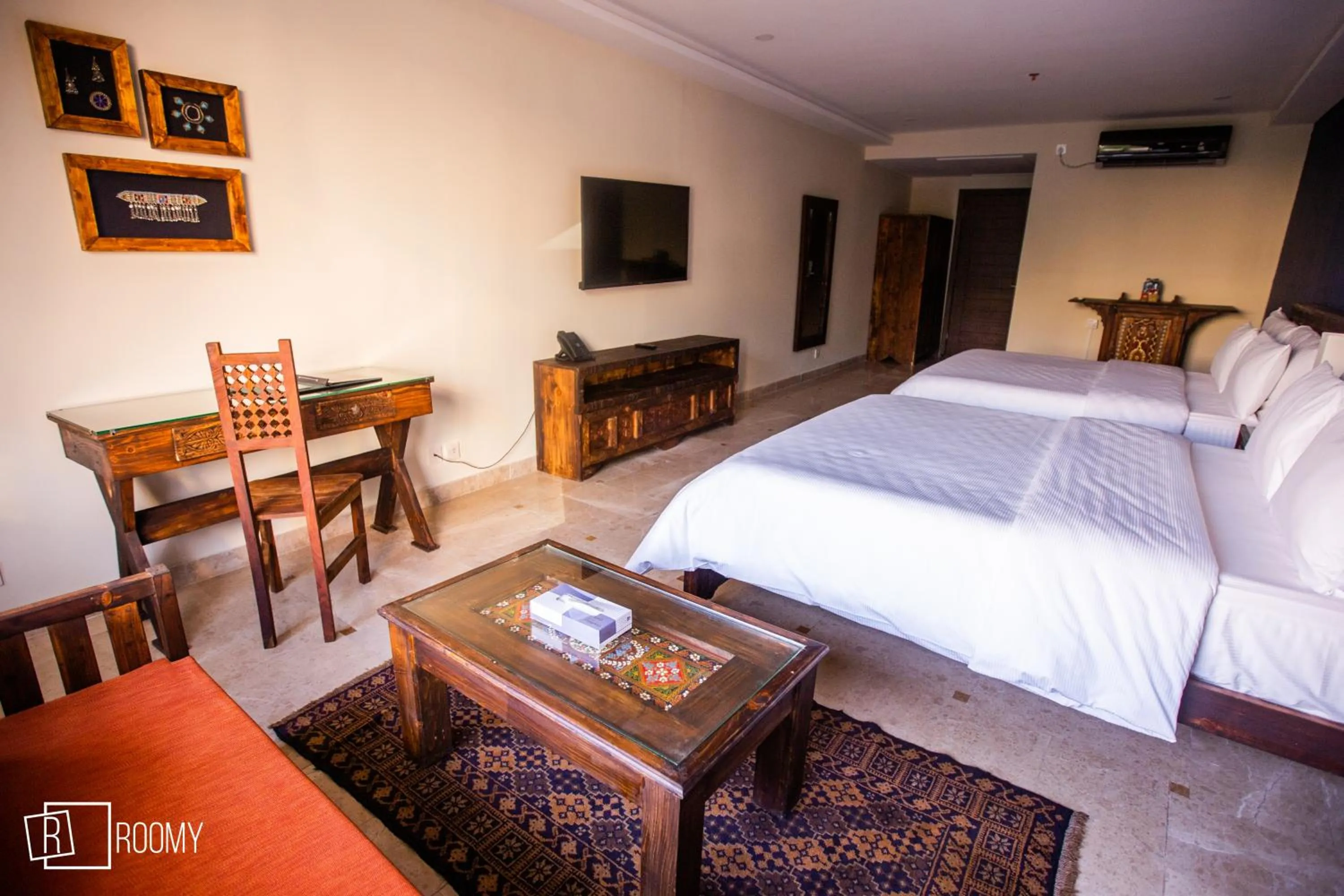 Bed in Roomy Signature Hotel, Islamabad