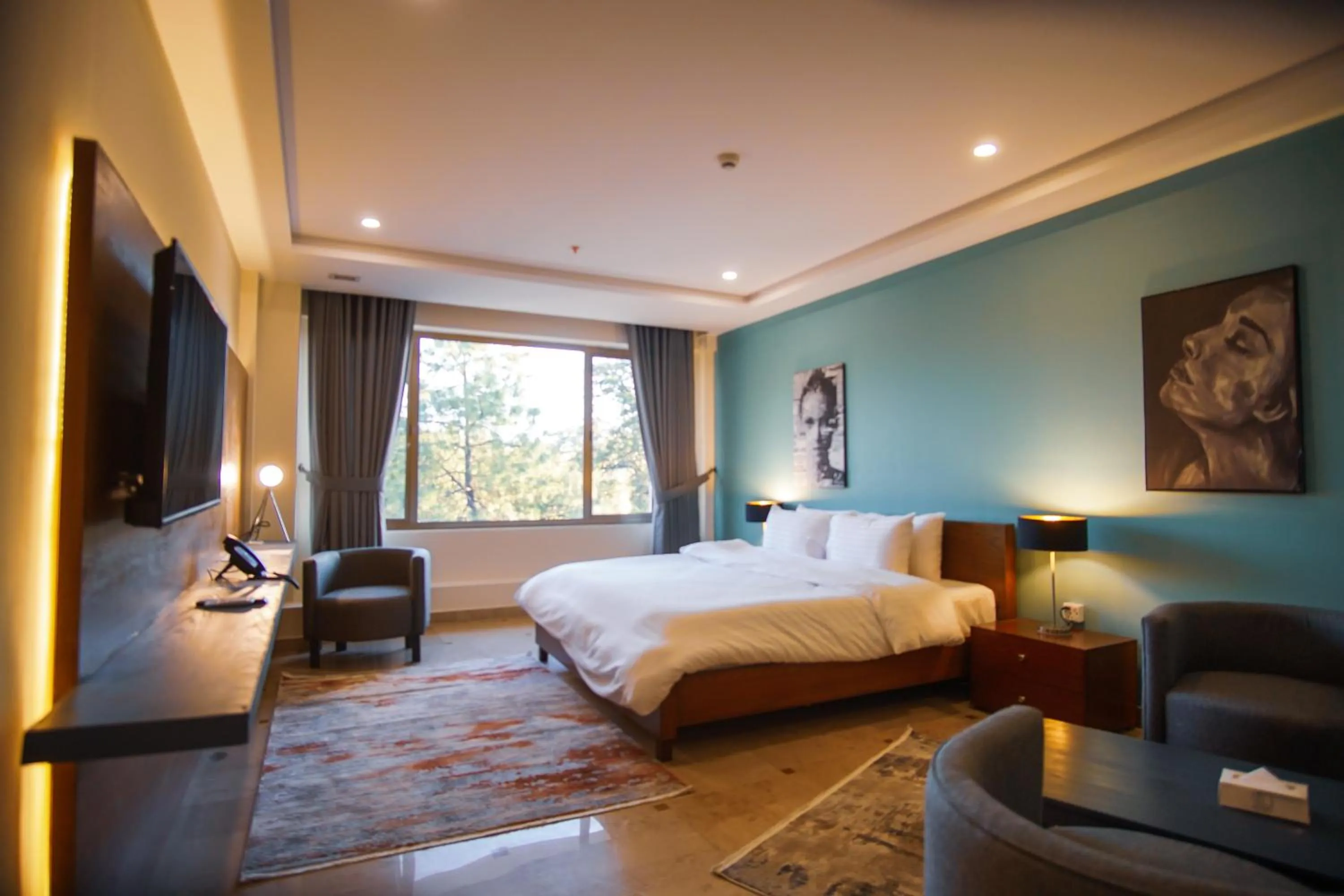 Photo of the whole room, Bed in Roomy Signature Hotel, Islamabad