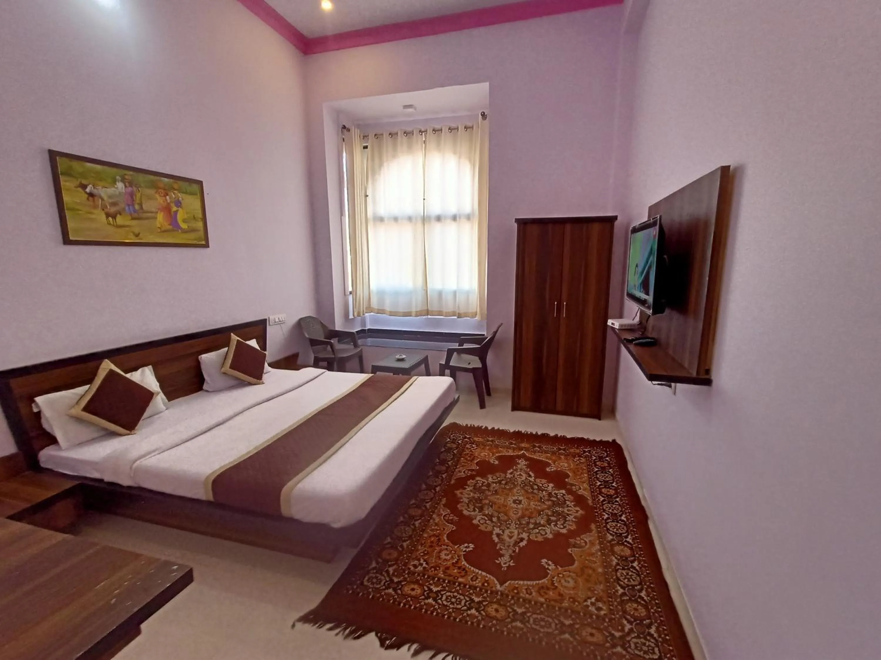 Communal lounge/ TV room, Bed in Jaigarh Palace Kumbhalgarh