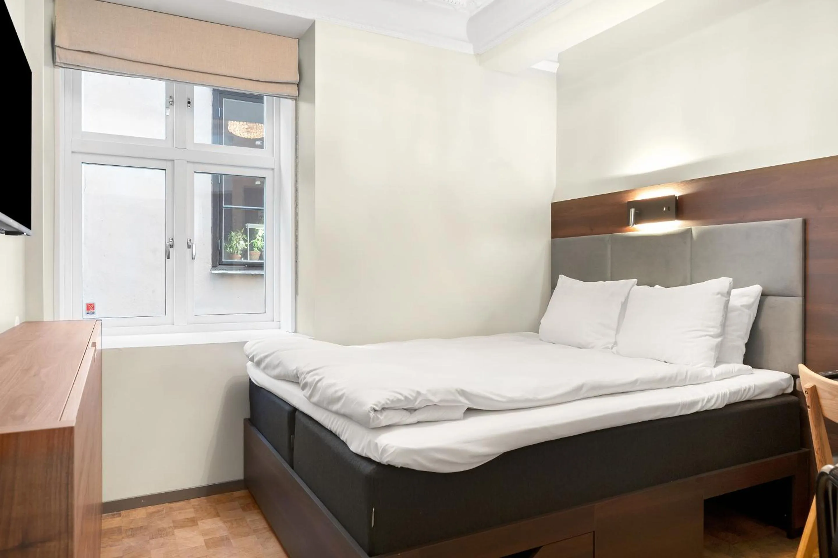 Bed in At Old Town Aparthotel