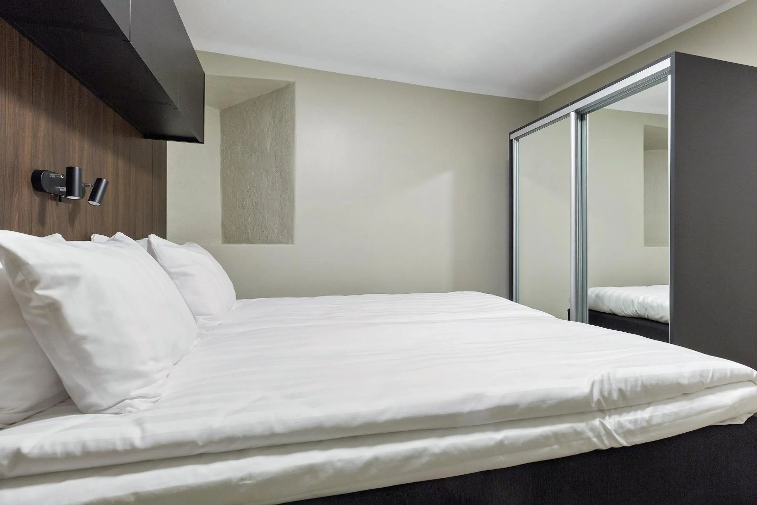 Bed in At Old Town Aparthotel