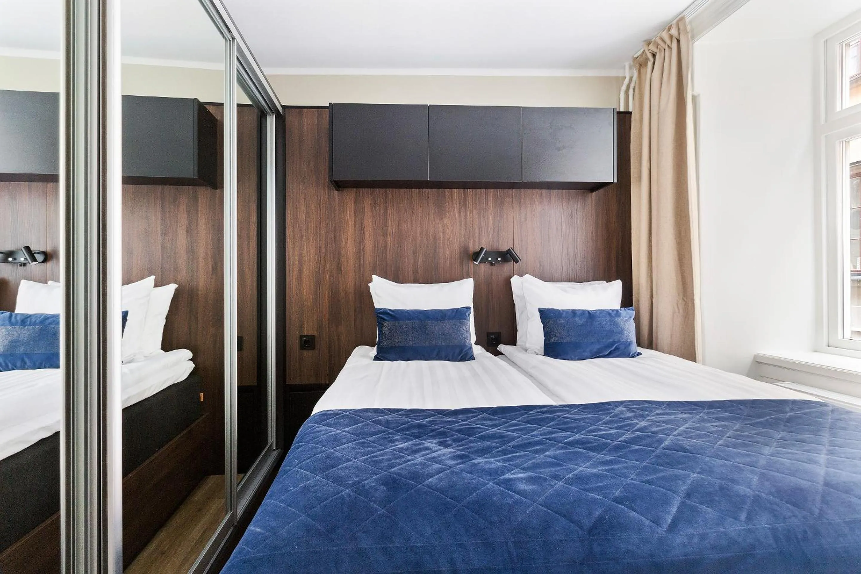 Bed in At Old Town Aparthotel