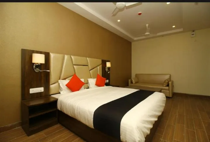 Bed in Hotel Sindhura Grand
