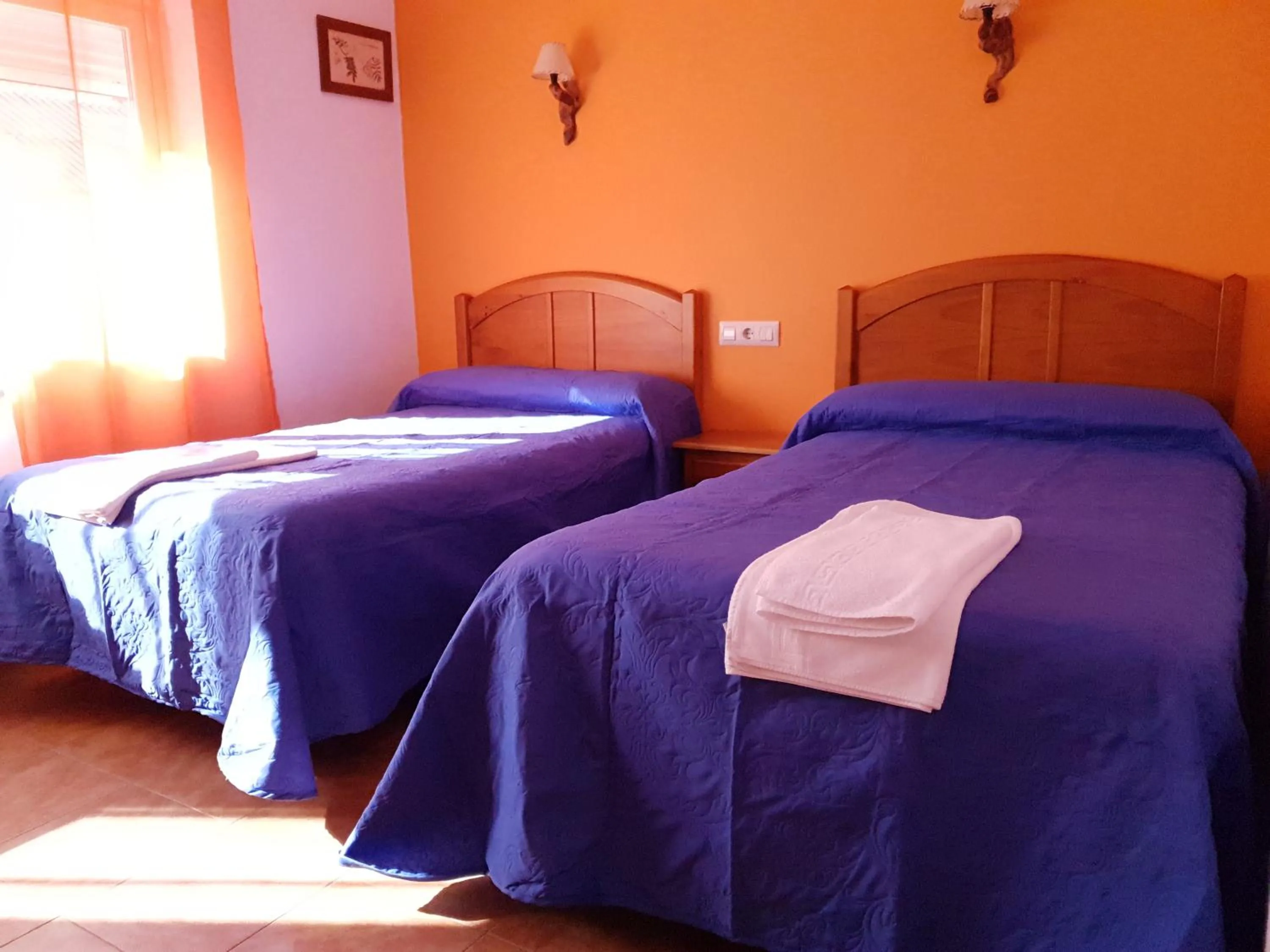 Bed in Hostal Río Mundo