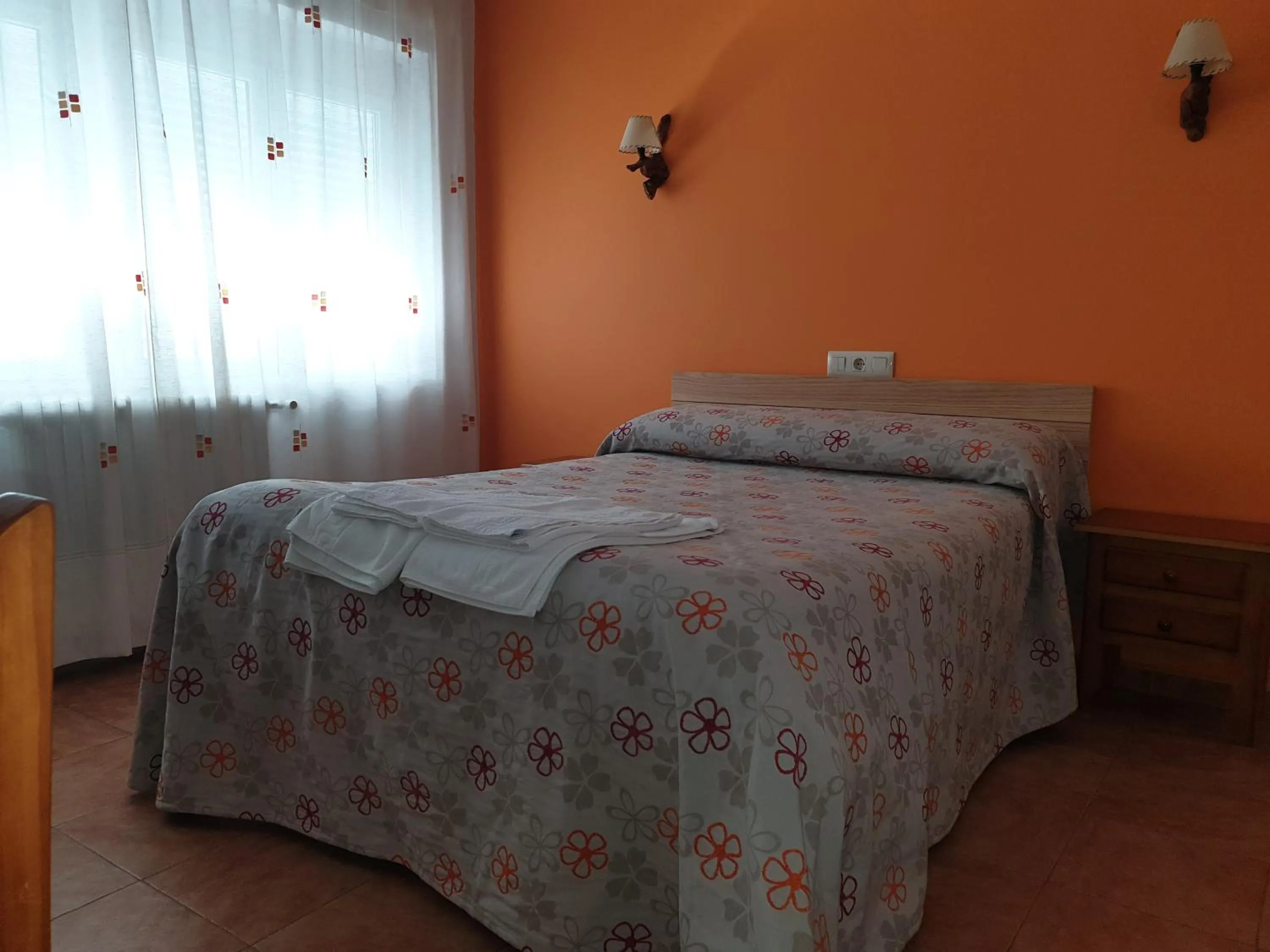 Bed in Hostal Río Mundo