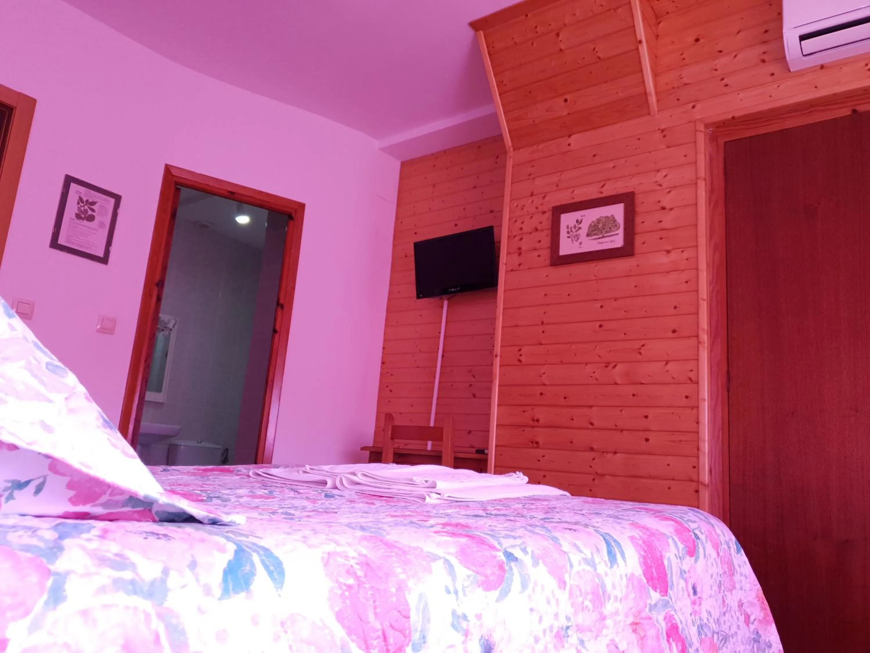 Bed in Hostal Río Mundo