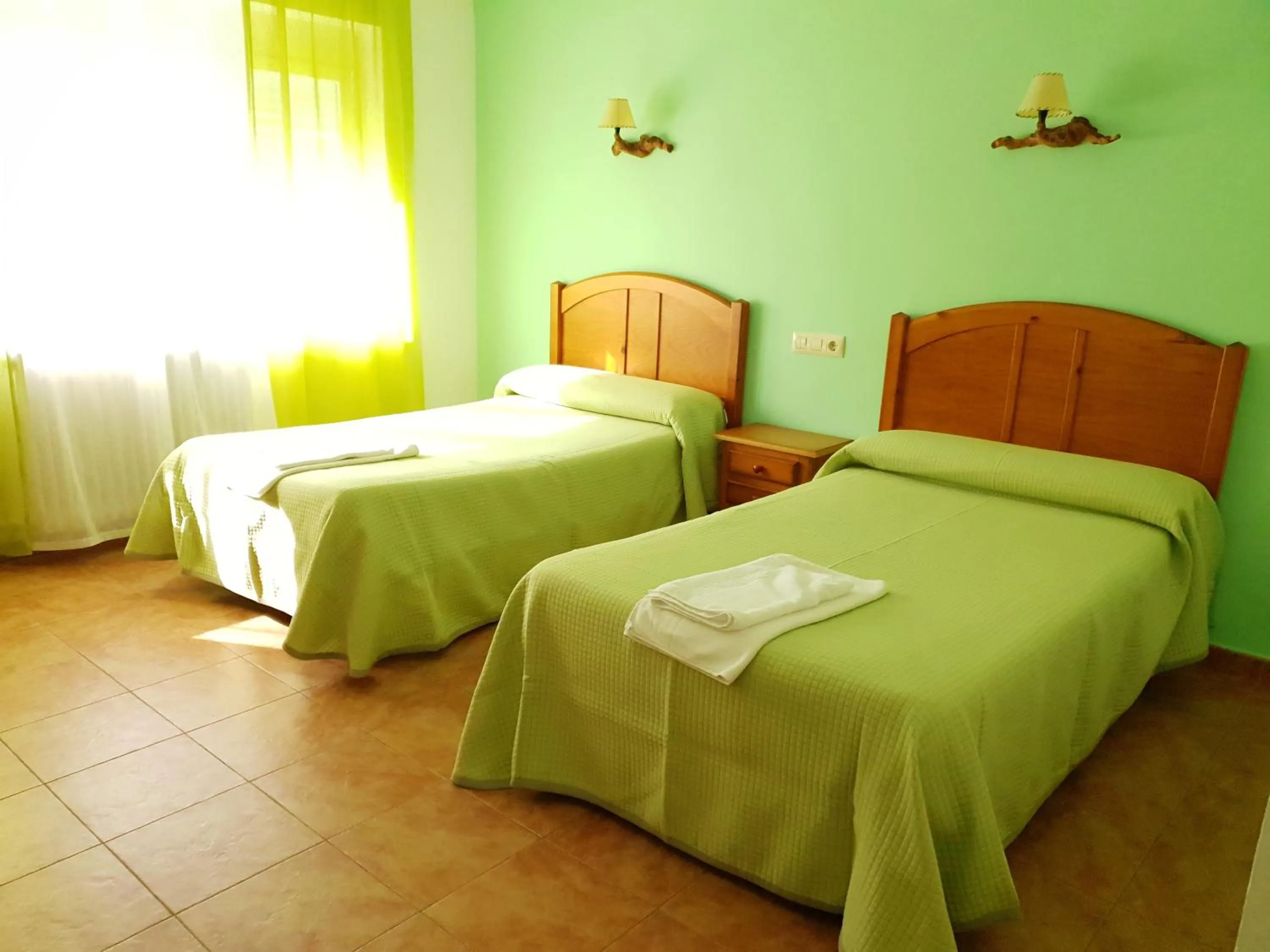 Bed in Hostal Río Mundo