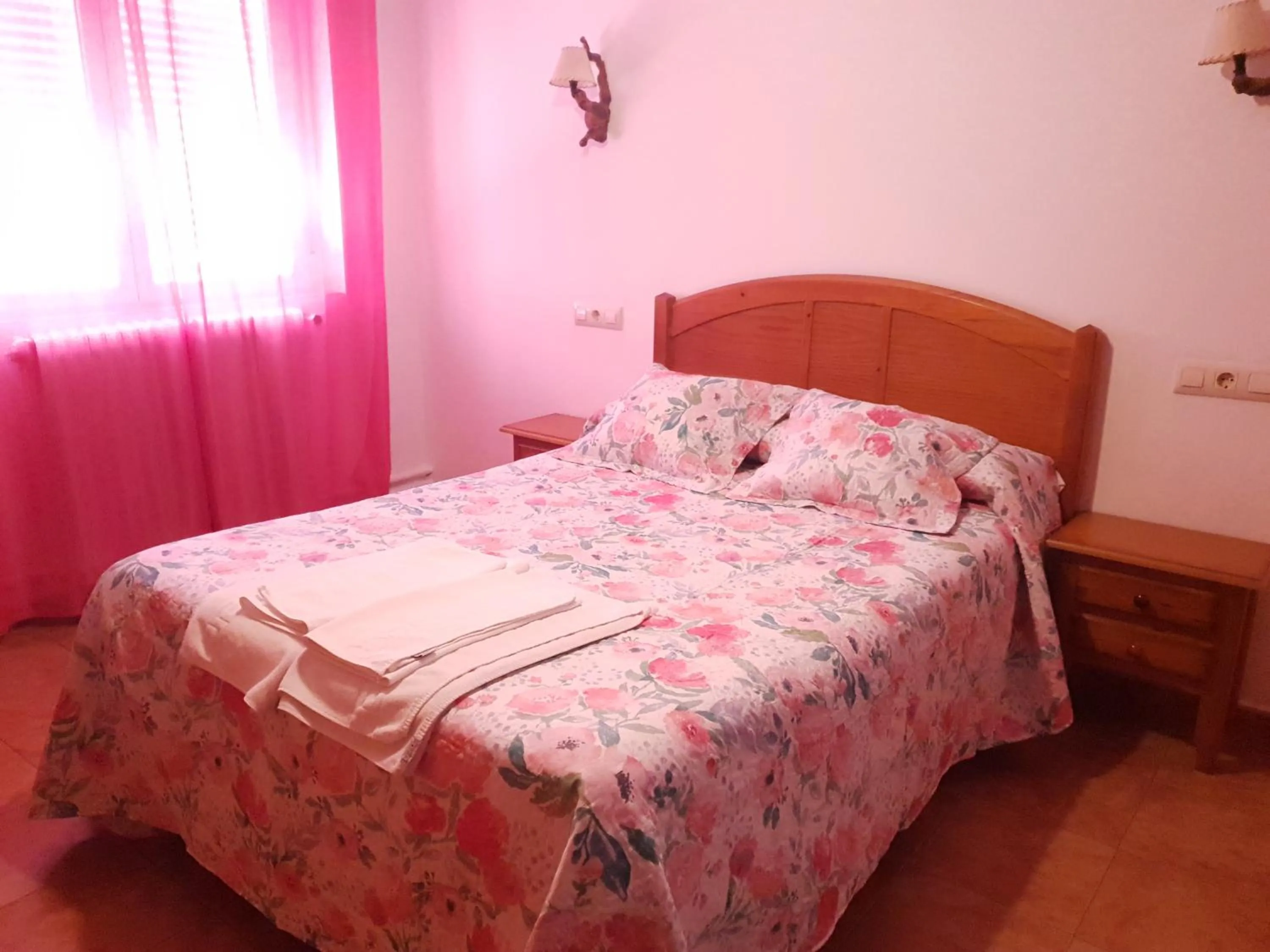 Bed in Hostal Río Mundo