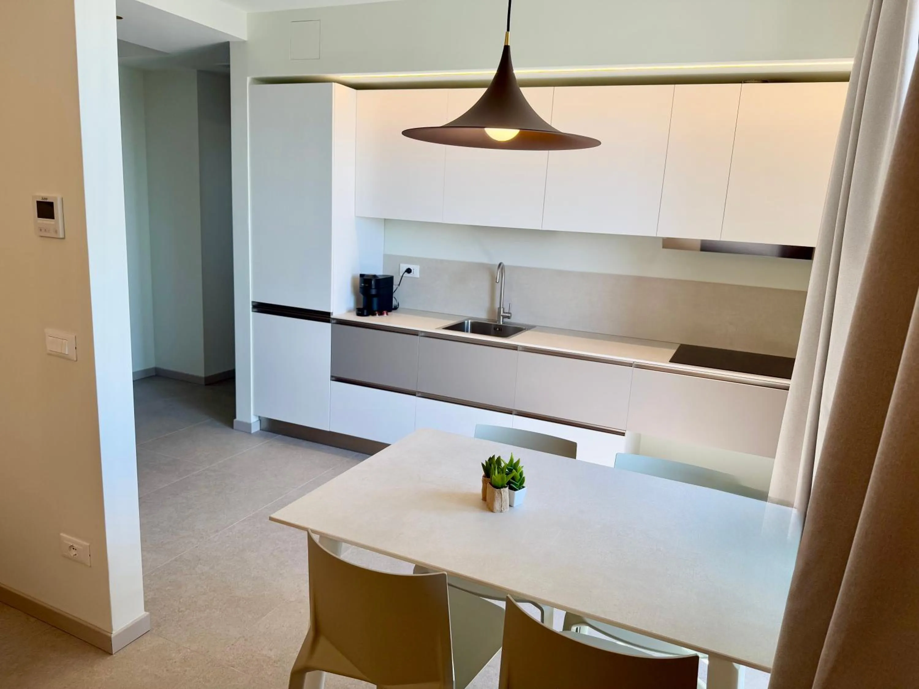 Kitchen or kitchenette in Hotel Paris Resort