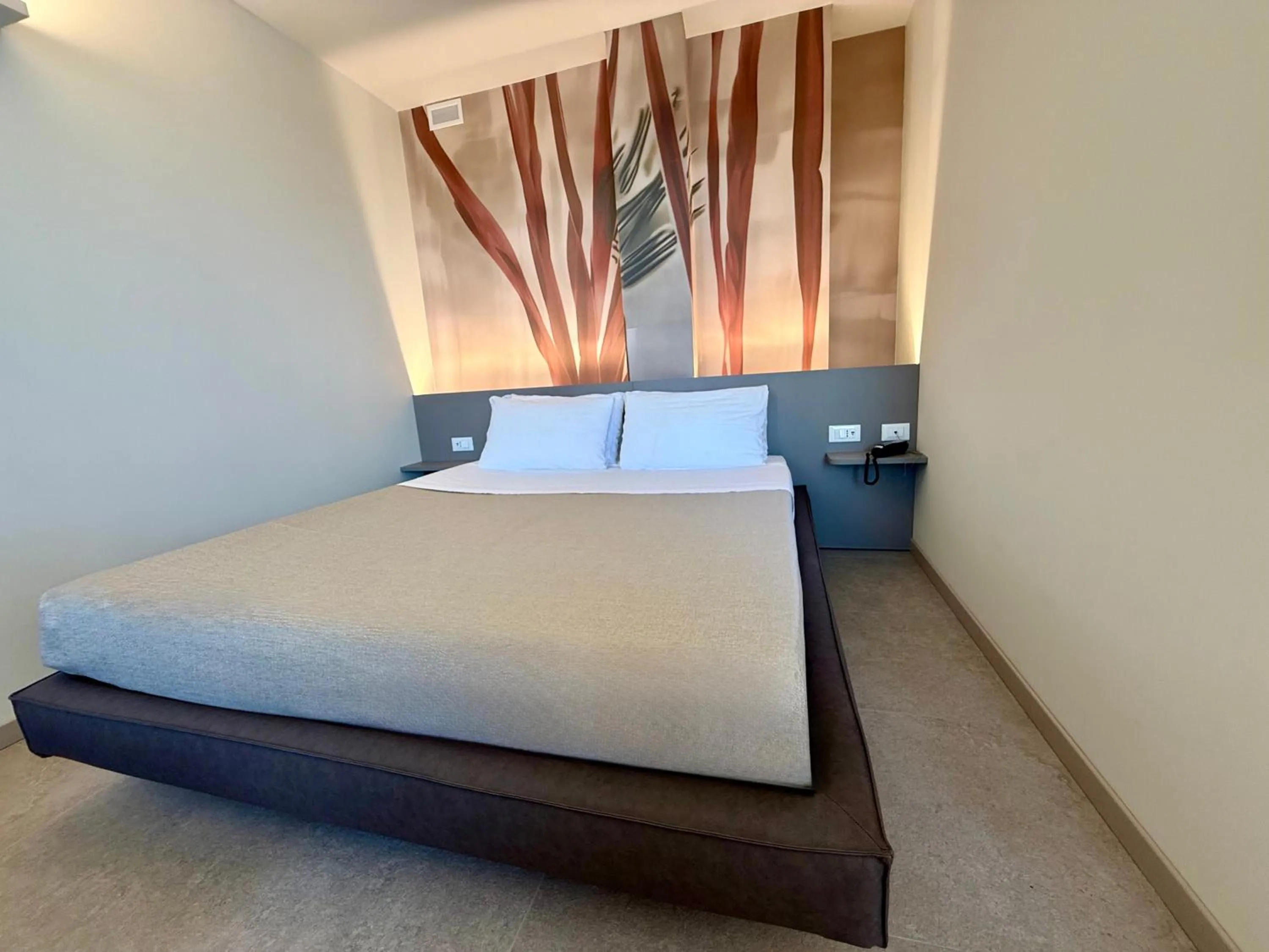 Bed in Hotel Paris Resort
