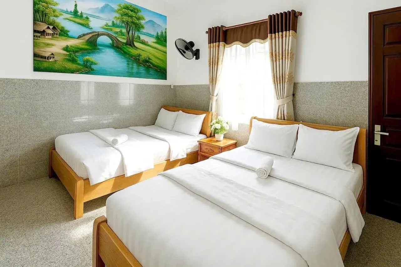Quadruple Room with Private Bathroom in Nam Hội An Hotel - Near Vinpearl Nam Hội An Quadruple Room with Private Bathroom in Nam Hội An Hotel - Near Vinpearl Nam Hội An