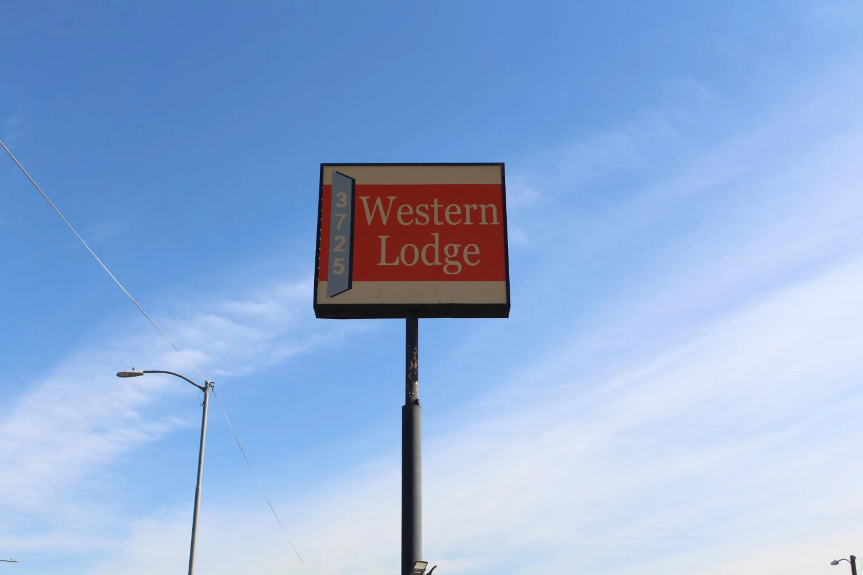 Property logo or sign in Western Lodge Phoenix Airport/Downtown