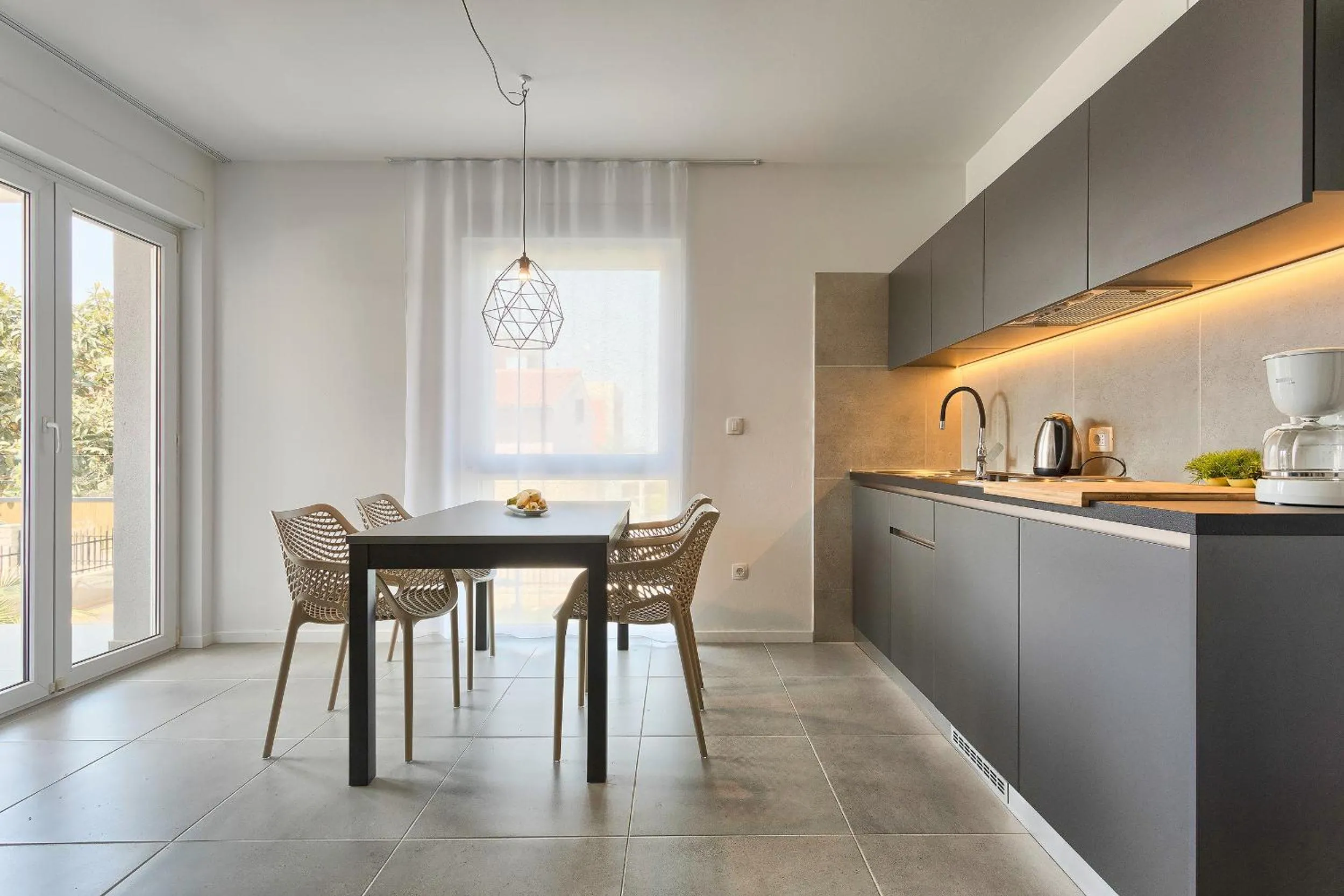 Kitchen or kitchenette in Astinian apartments Jadranka