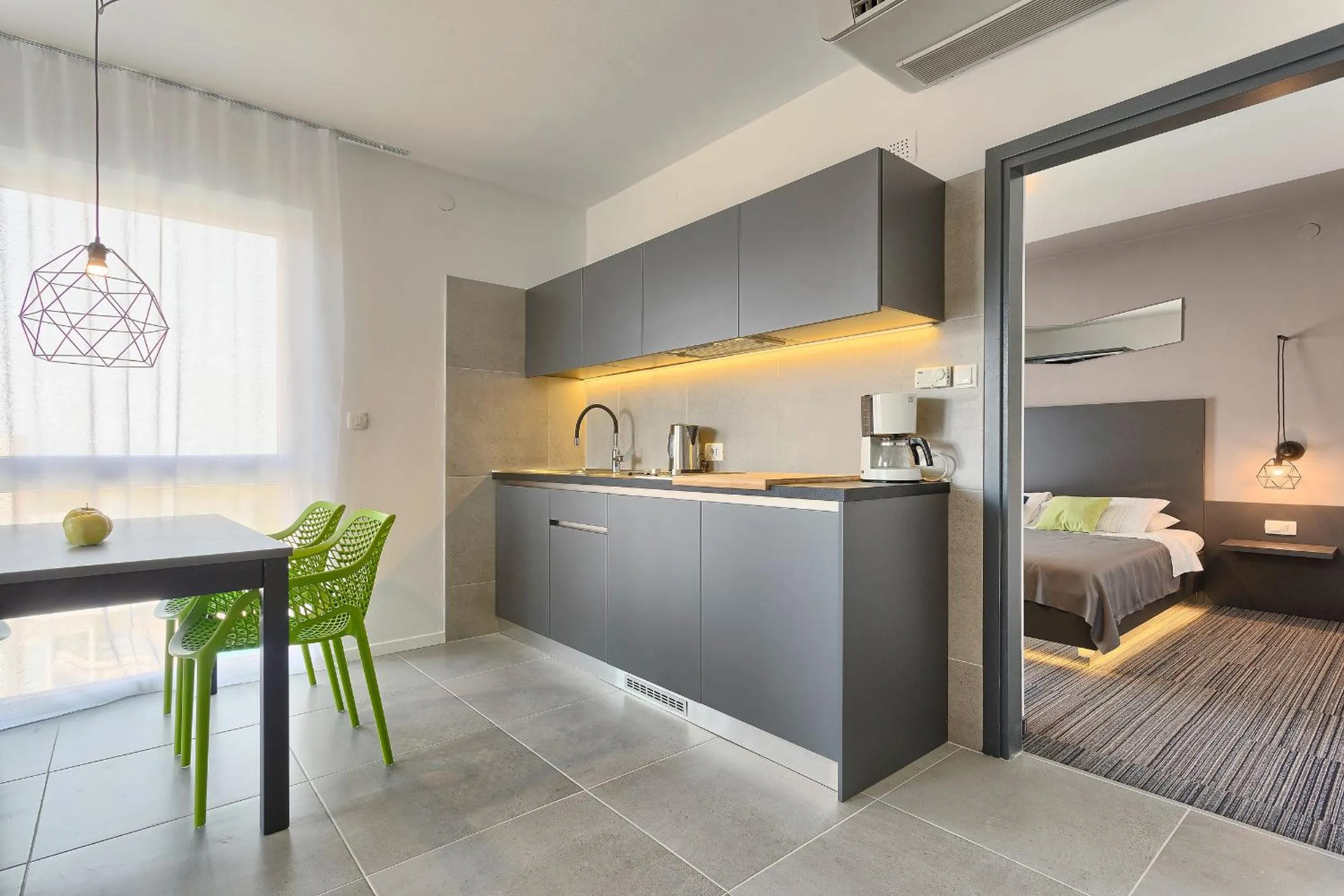 Kitchen or kitchenette, Bed in Astinian apartments Jadranka