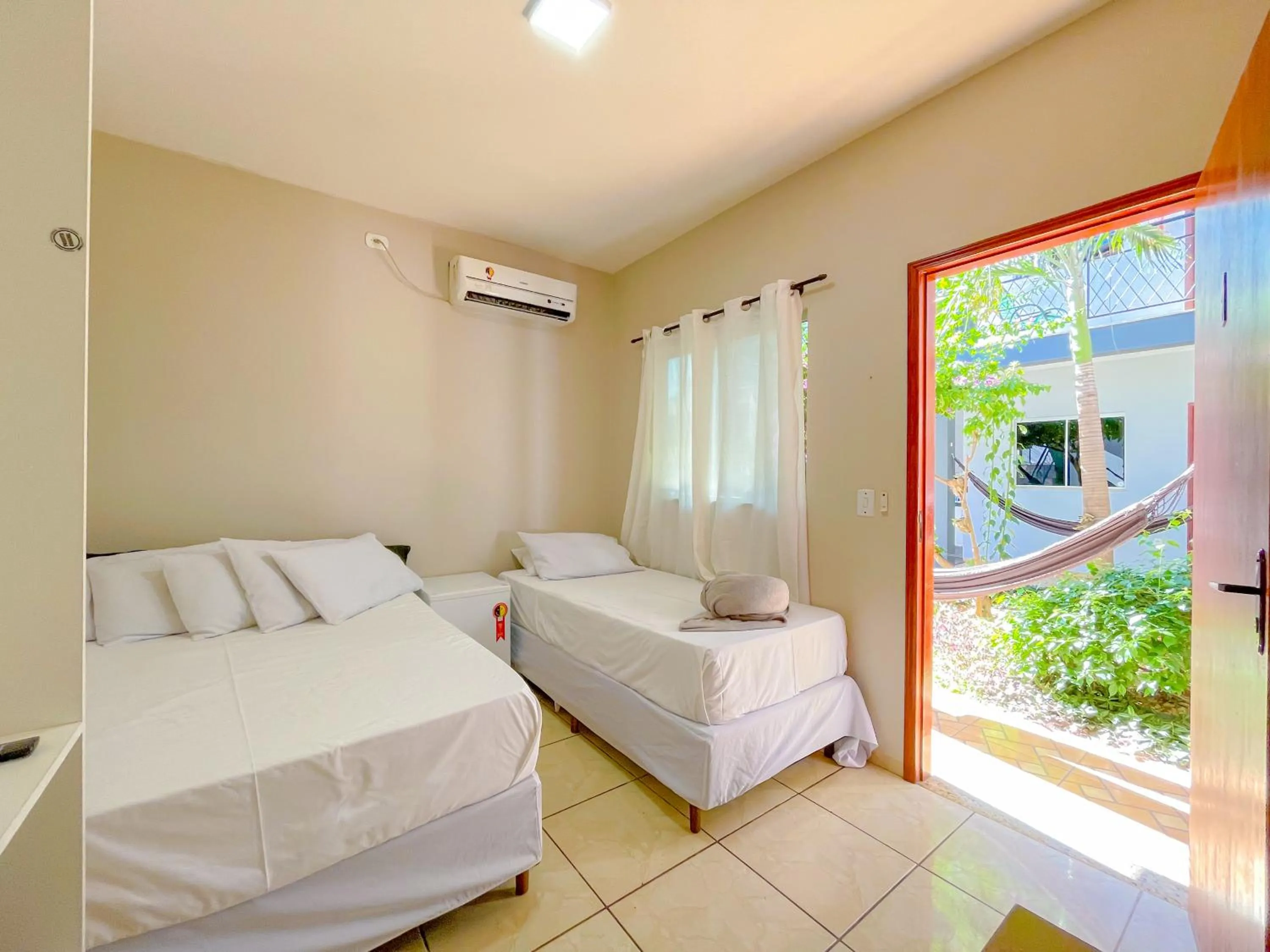 Bed in Pousada Papaya - Bonito