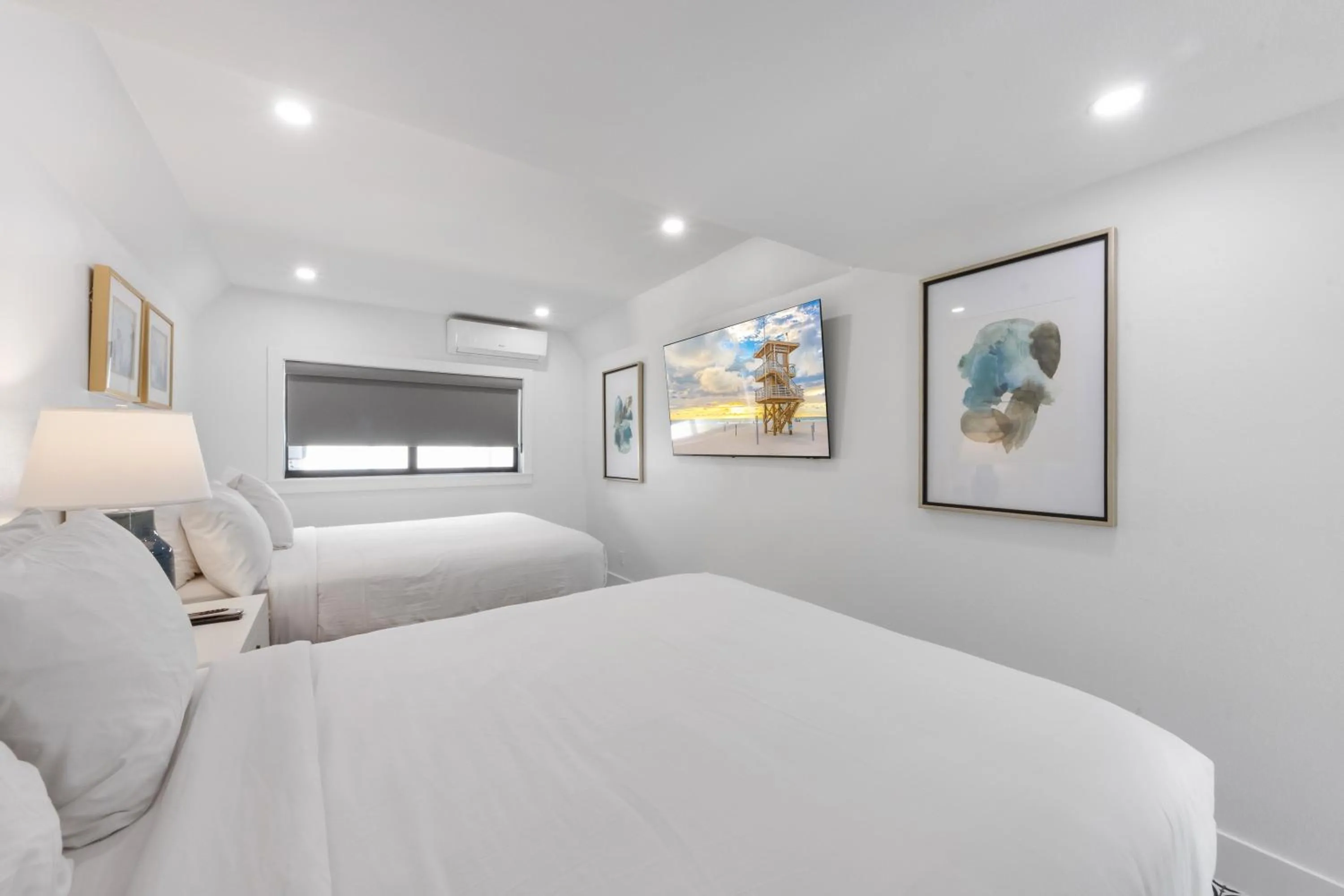 Bed in The Retreat at Anna Maria Island Inn