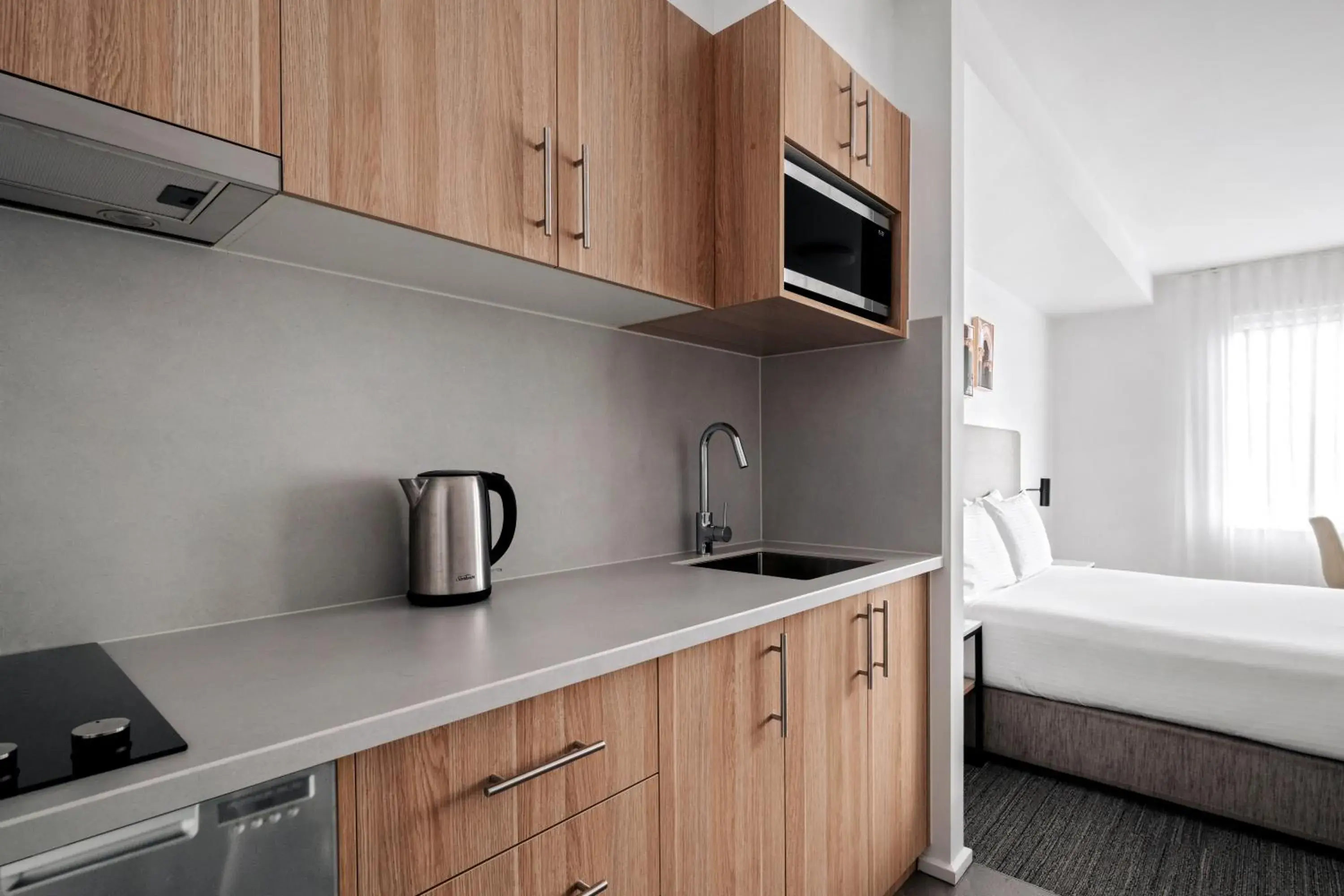 Kitchen or kitchenette, Bed in Quest Moonee Valley Kitchen or kitchenette, Bed in Quest Moonee Valley