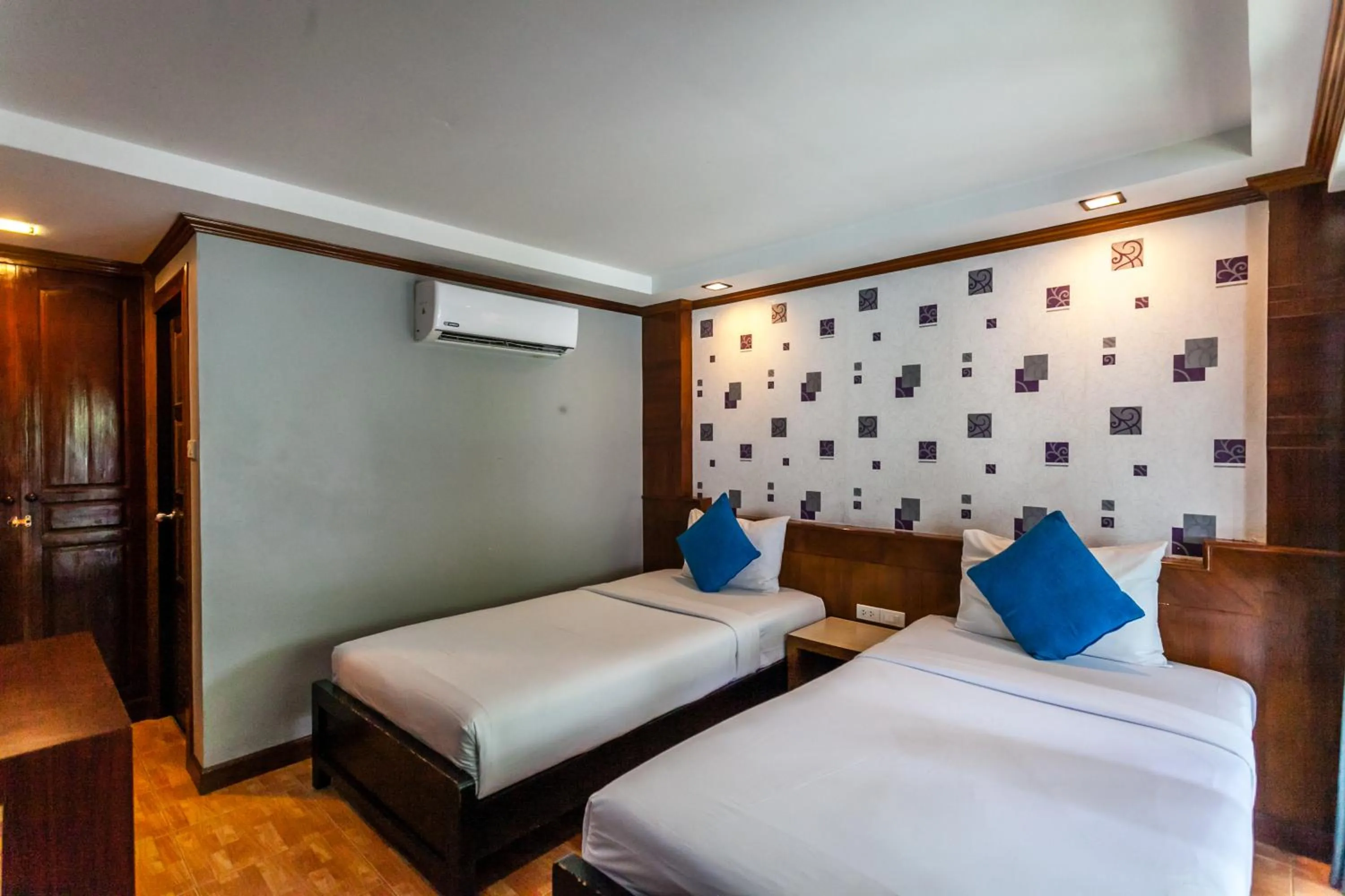 Bed in Coco Bella Hotel