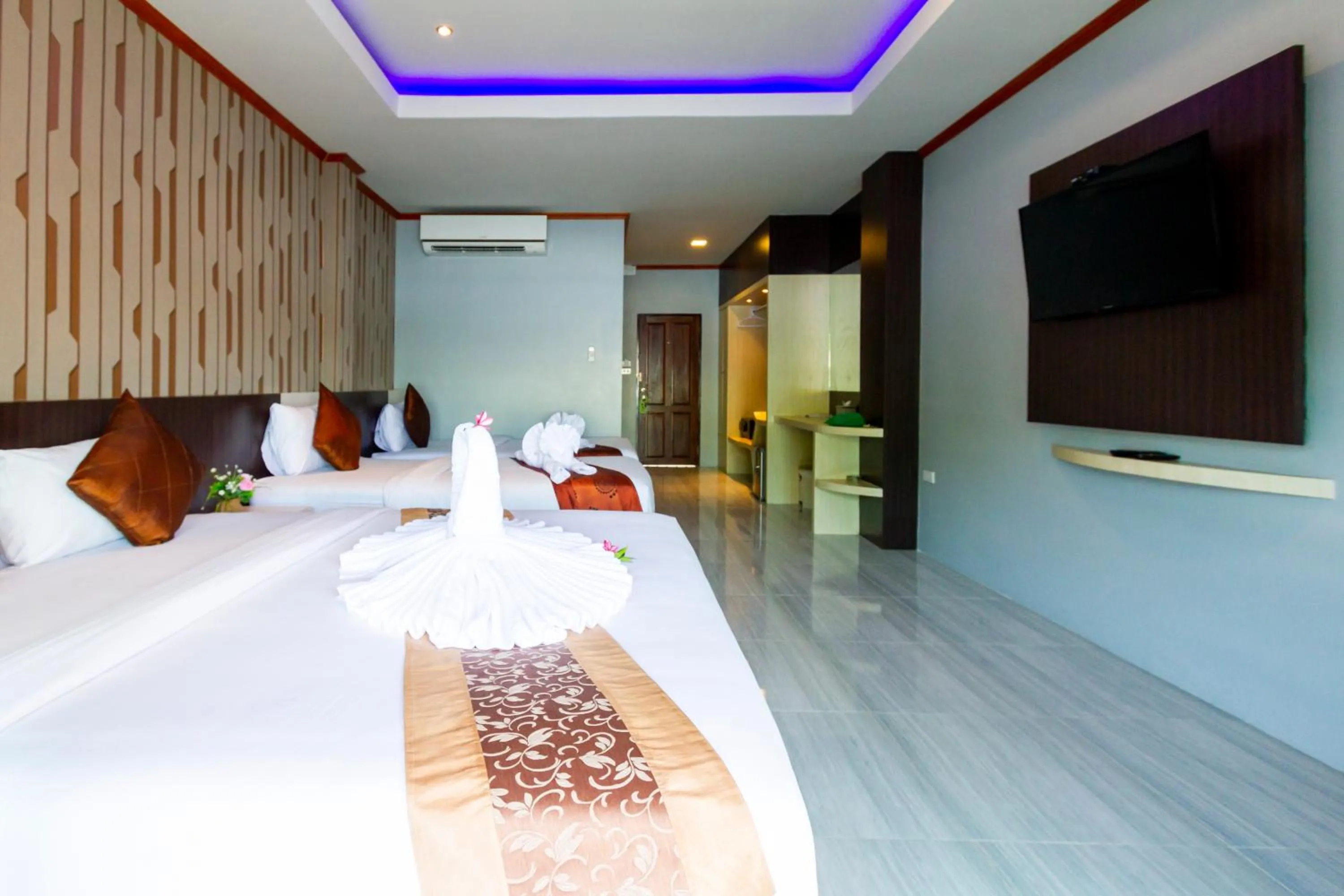 Bed in Coco Bella Hotel