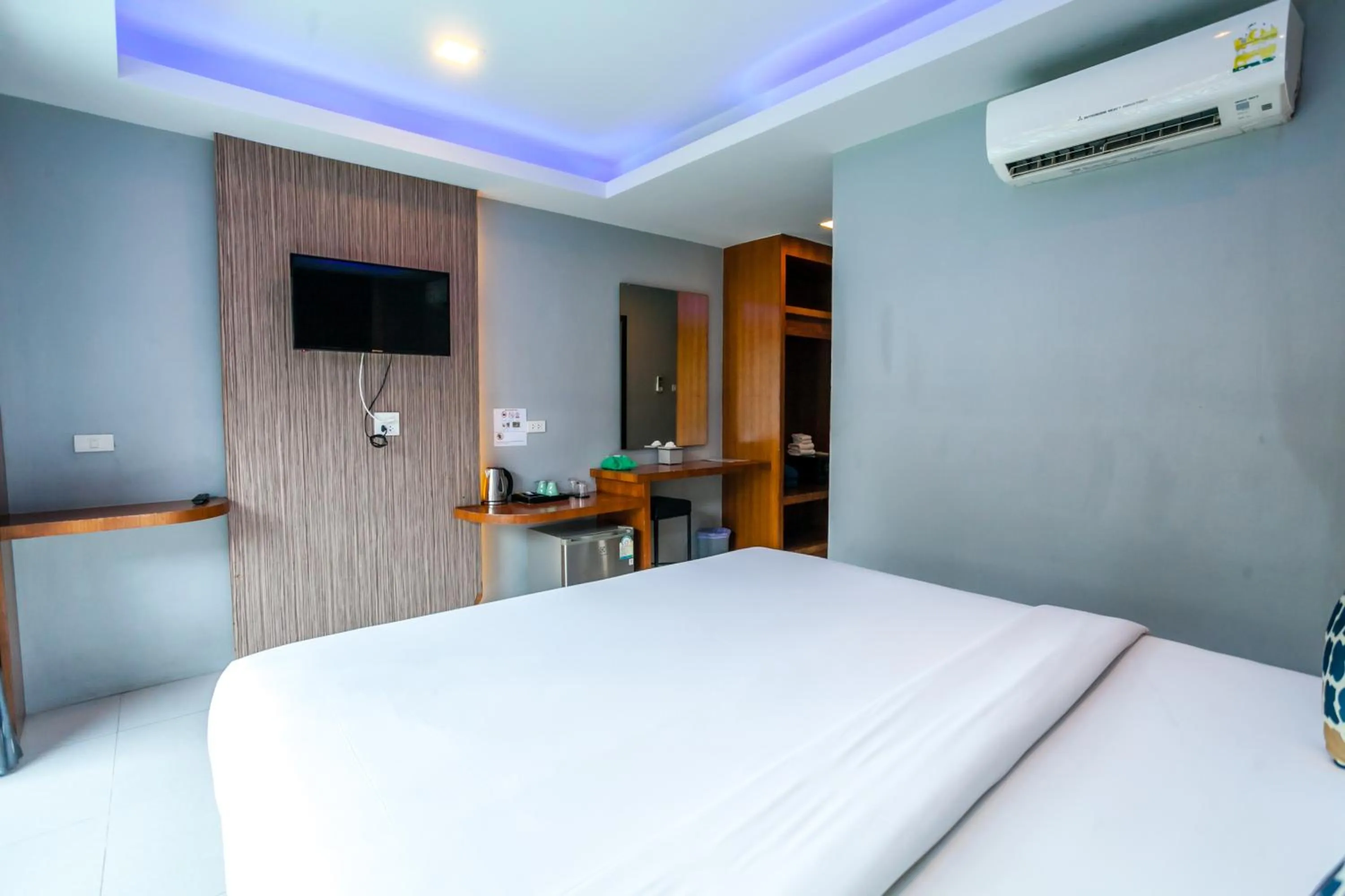 Bed in Coco Bella Hotel