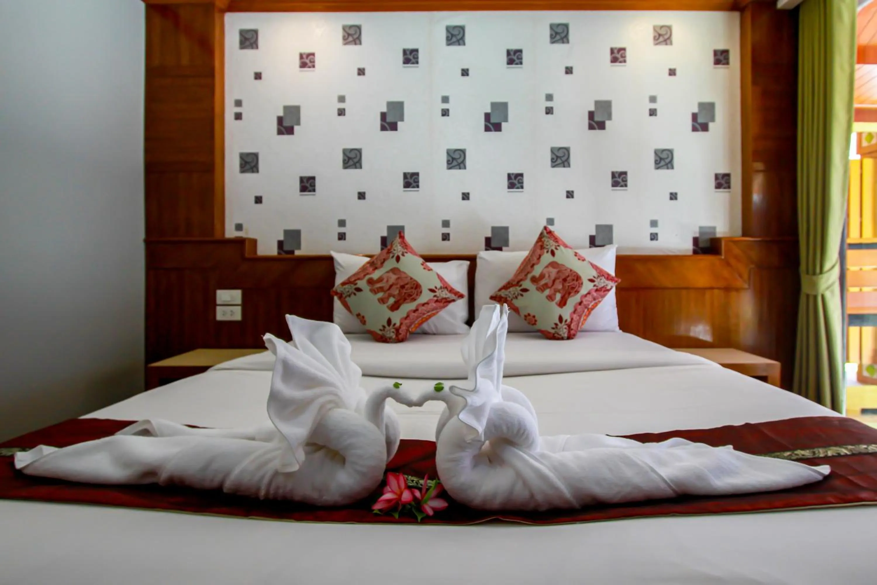 Bed in Coco Bella Hotel