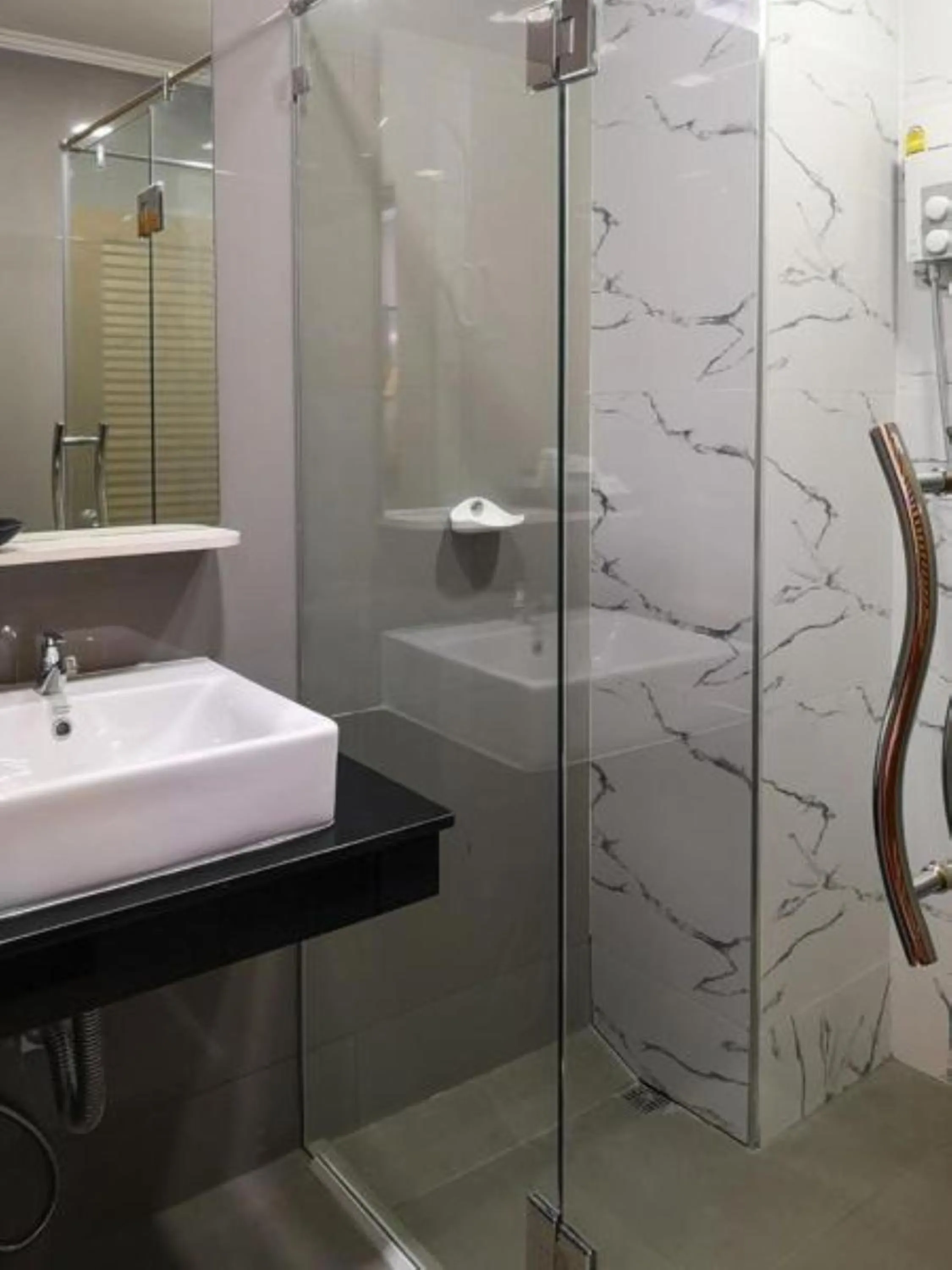 Shower in Coco Bella Hotel