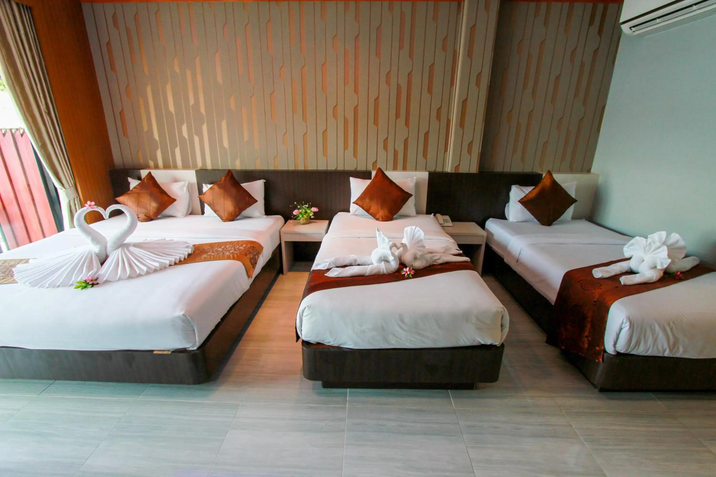Bed in Coco Bella Hotel