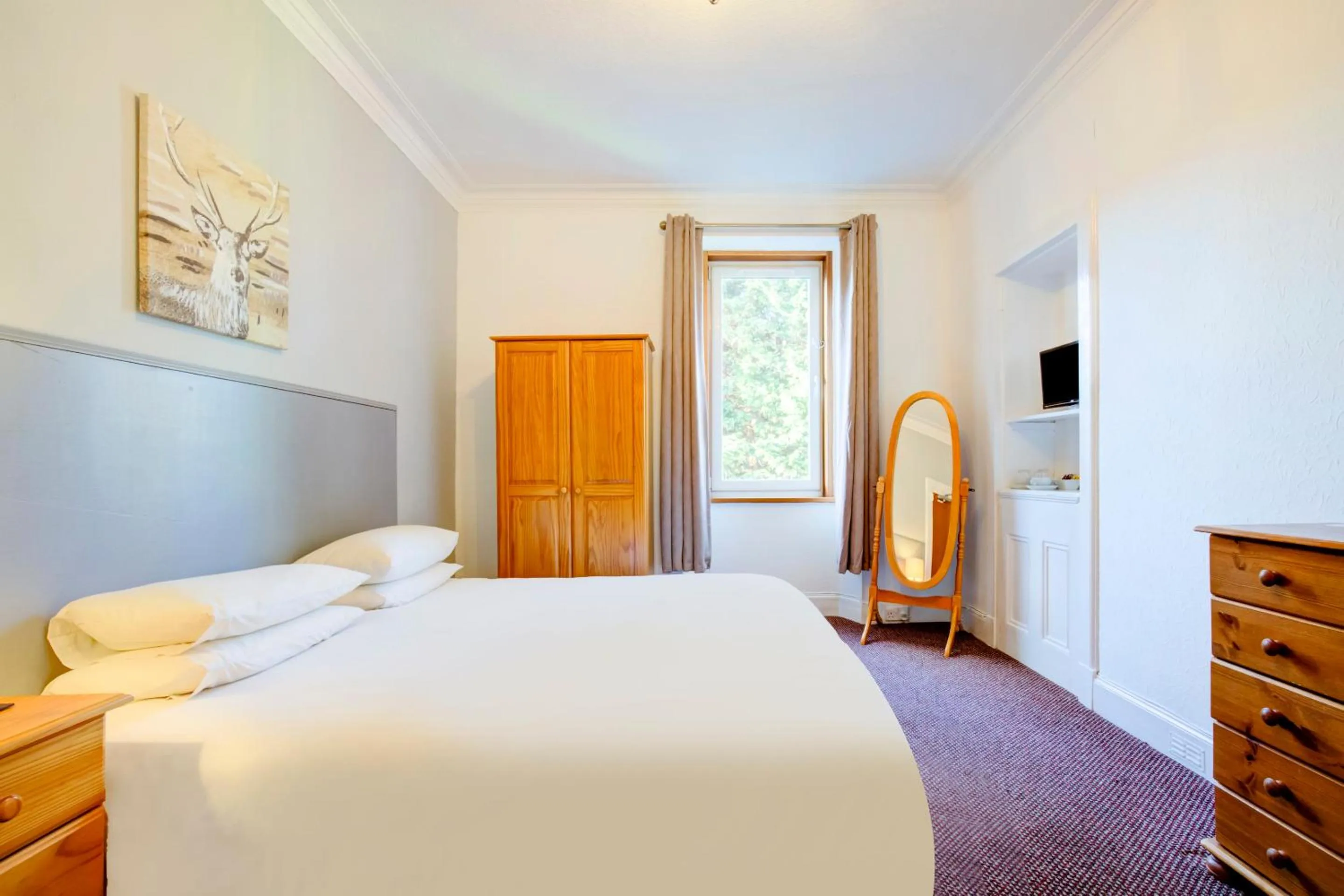 Bedroom in OYO Eastbank Hotel, Speyside Scotland