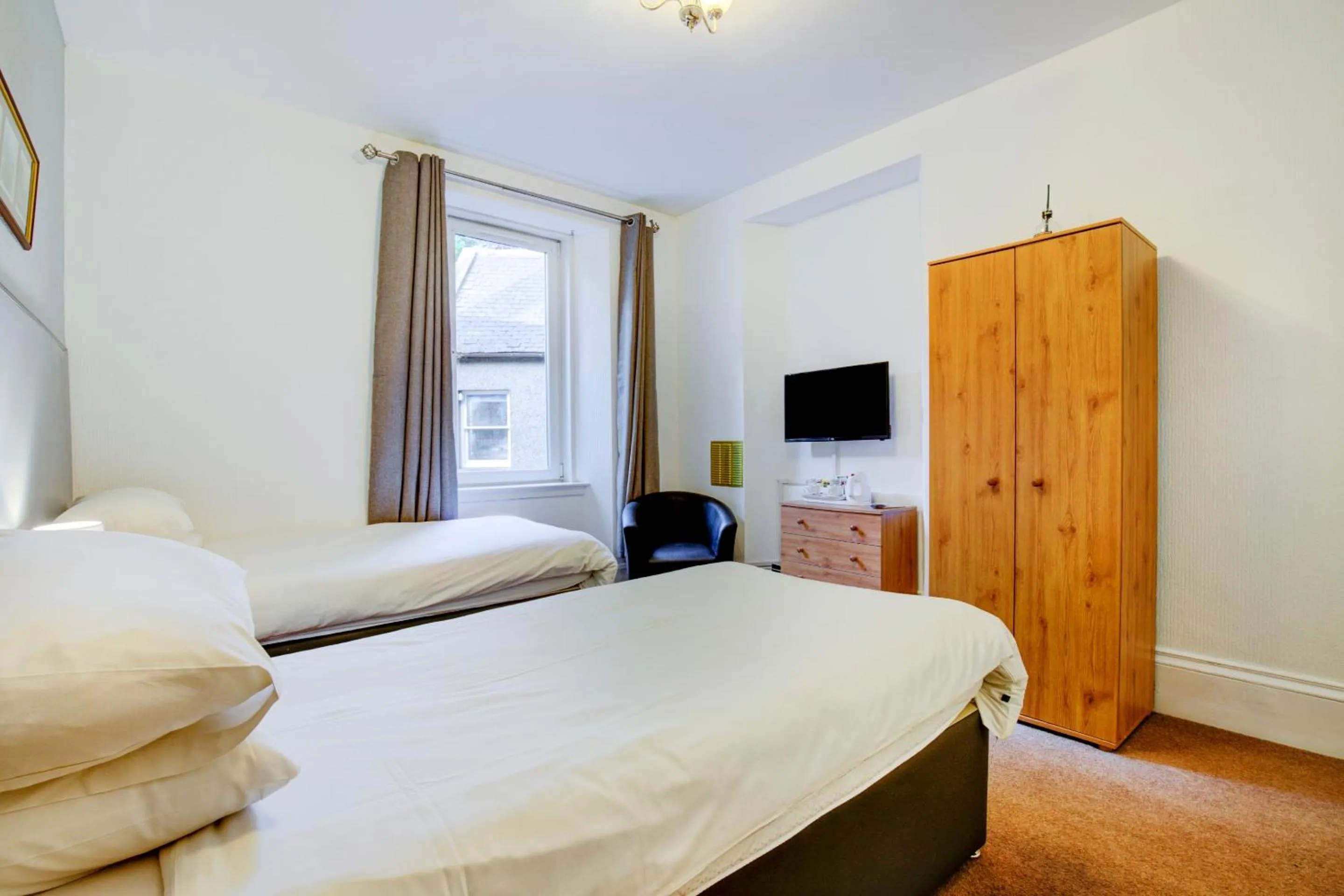 Bed in OYO Eastbank Hotel, Speyside Scotland