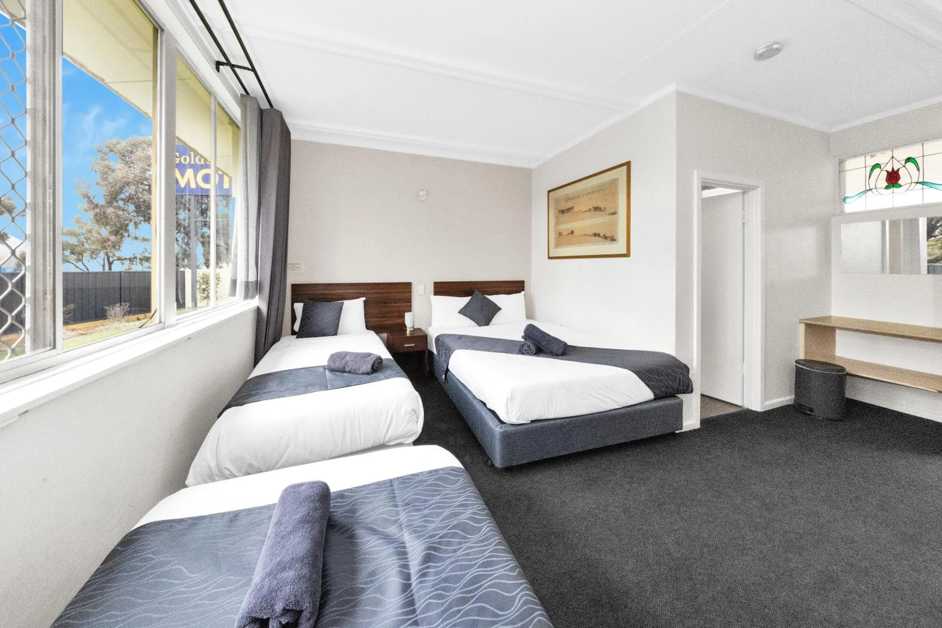 Bed in Golden Hills Motel